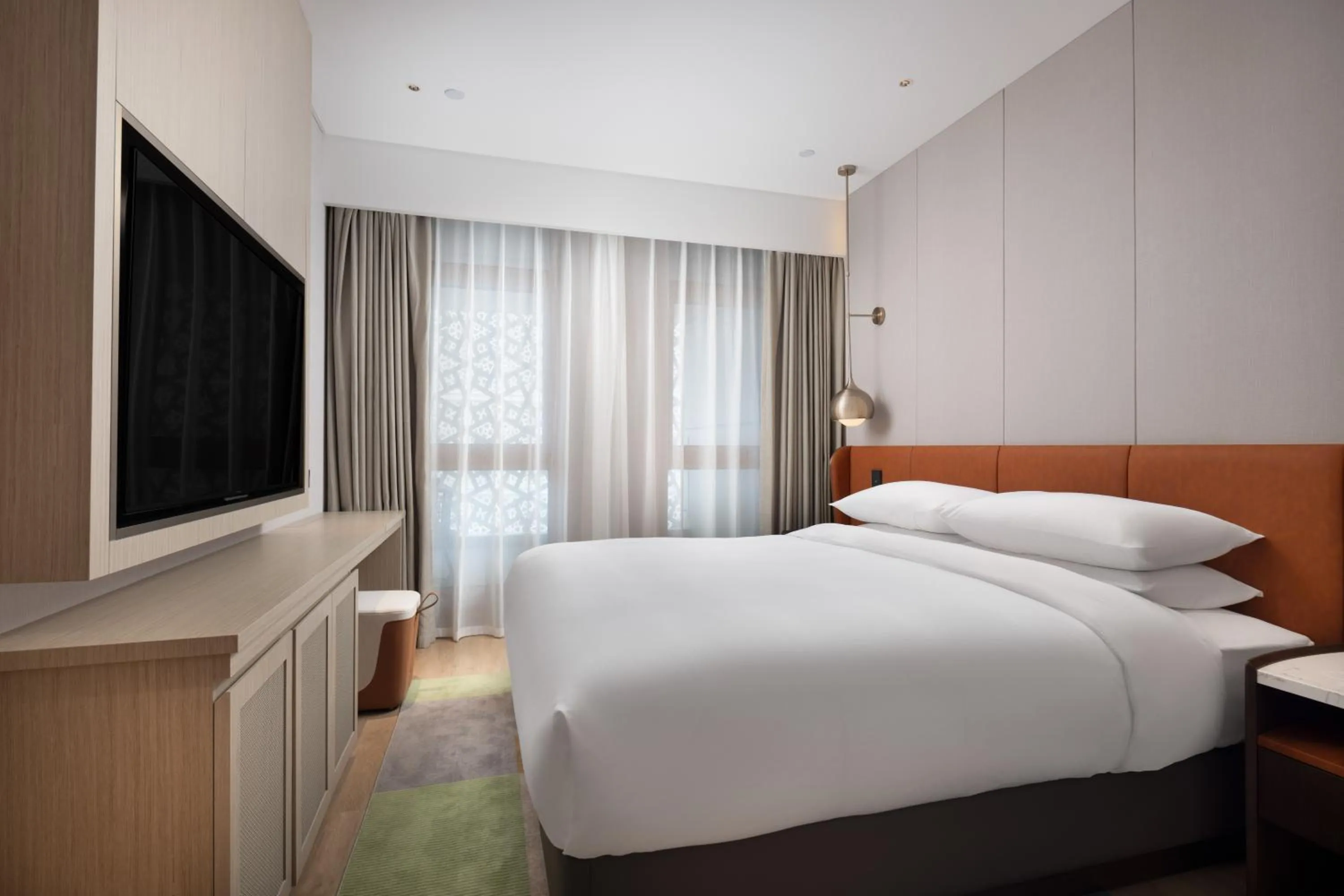 Bed in Home2 Suite by Hilton Binzhou Boxing