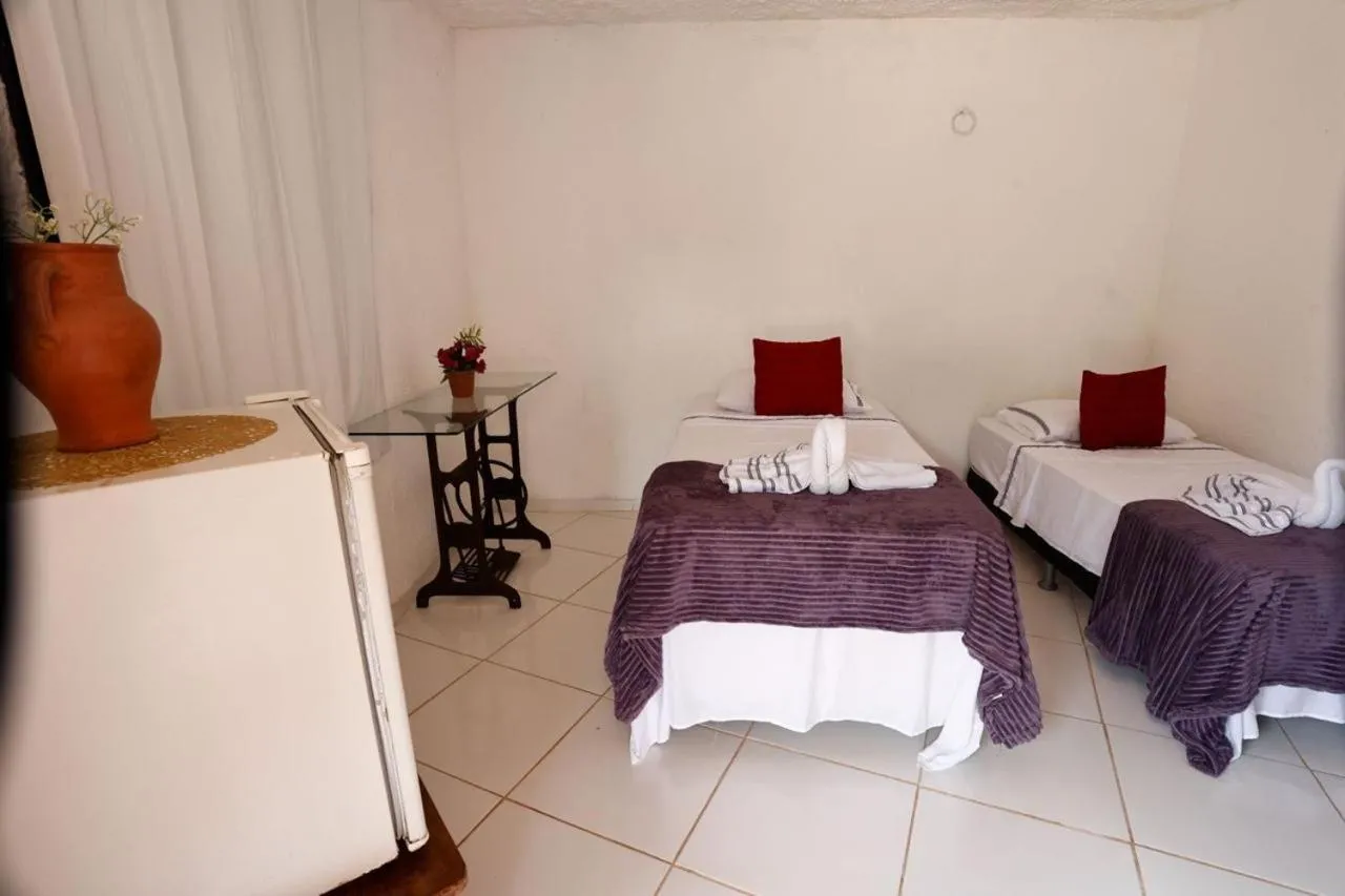 Bed in Pousada Marajoara- Hotel Fazenda-Turismo de Aventura