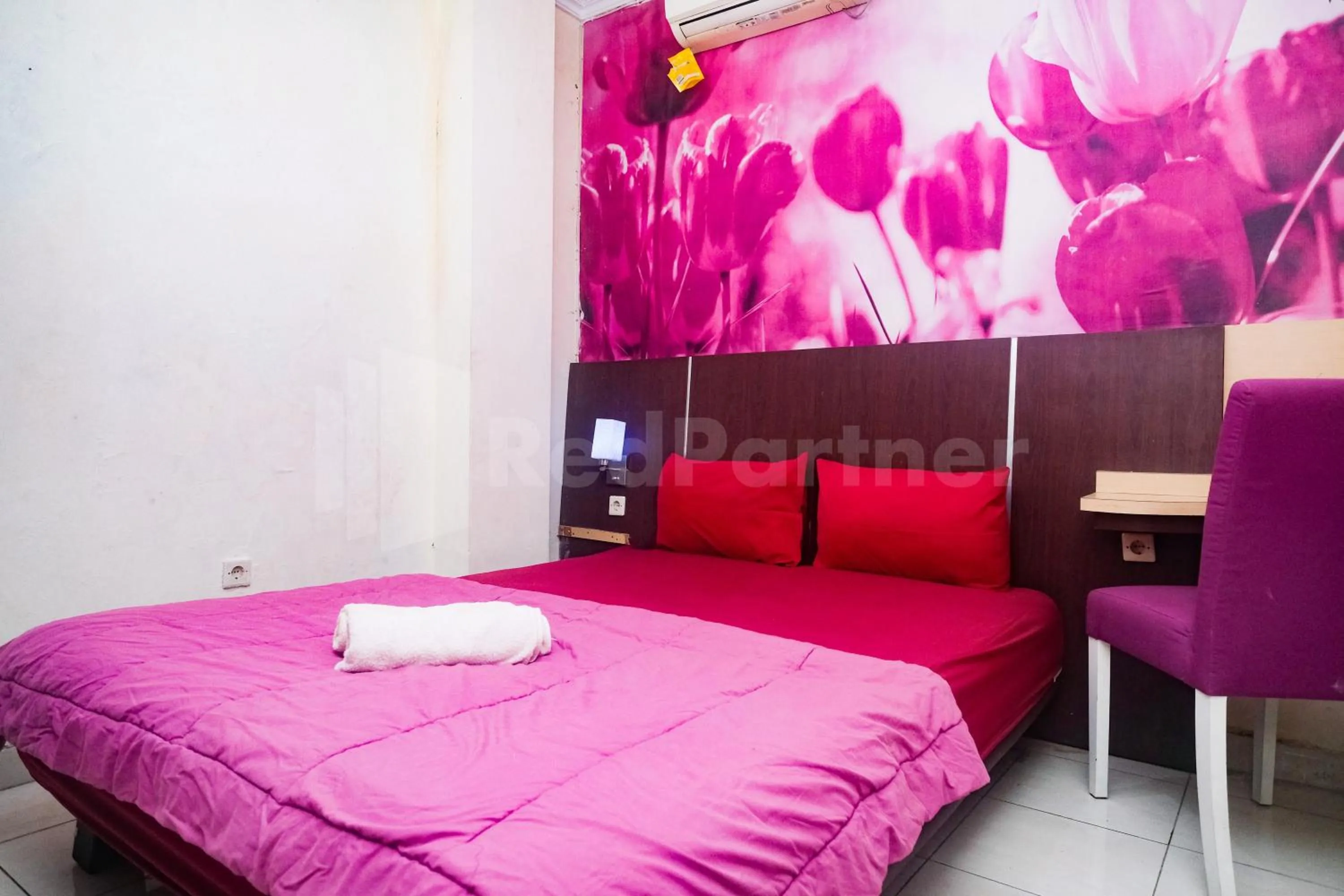 Bedroom, Bed in Bies Malioboro Hotel RedPartner