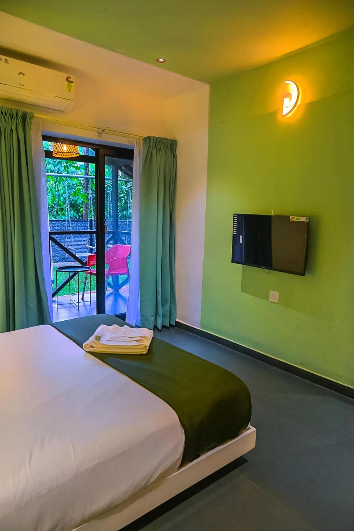 TV and multimedia, Bed in Bay View Suites, Vythiri, Wayanad