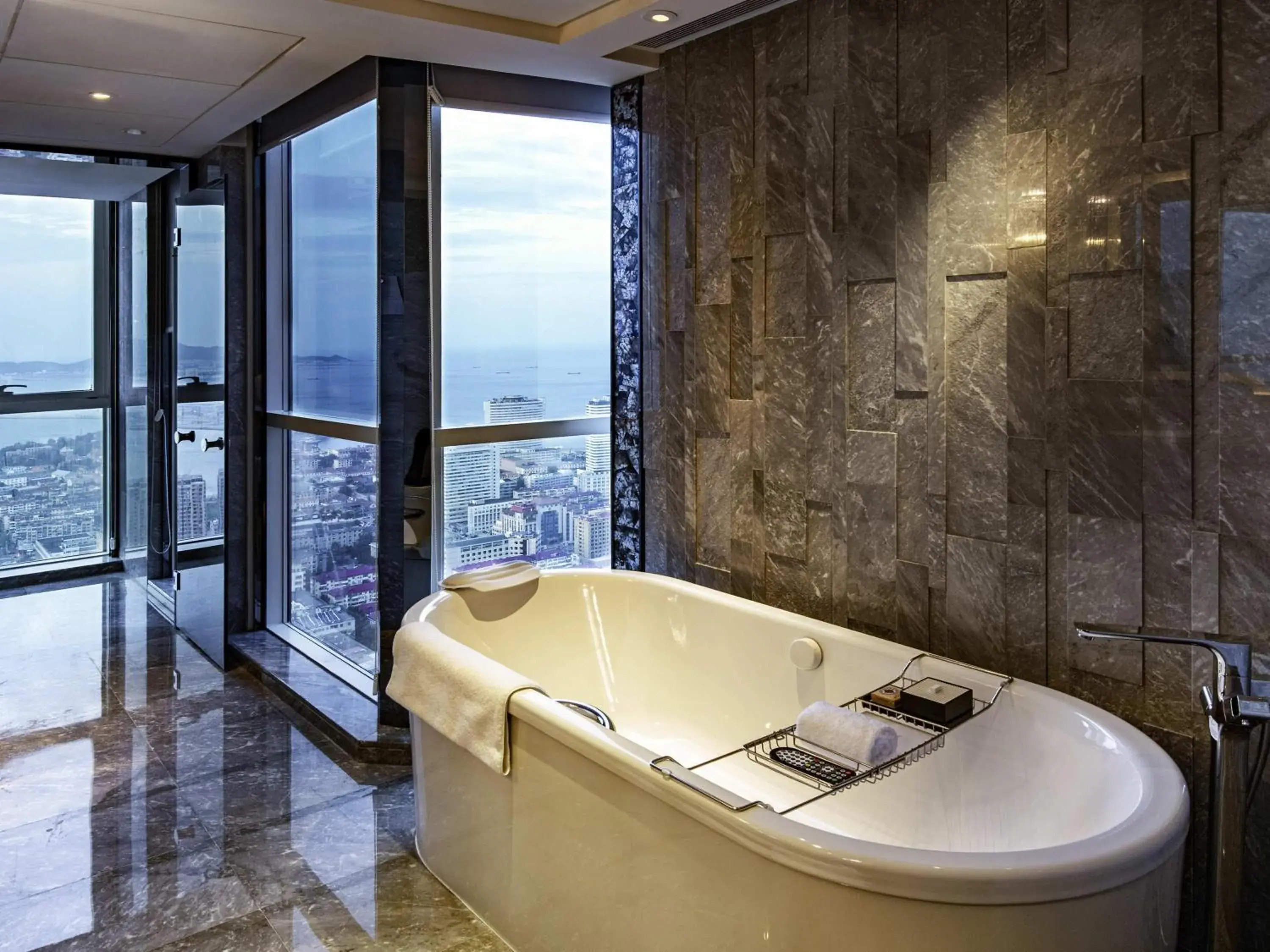 Bedroom in Pullman Yantai Center Bedroom in Pullman Yantai Center