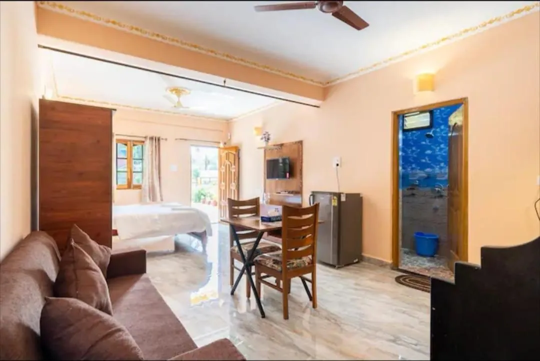 TV and multimedia, Bed in Rodrigues Residency Goa