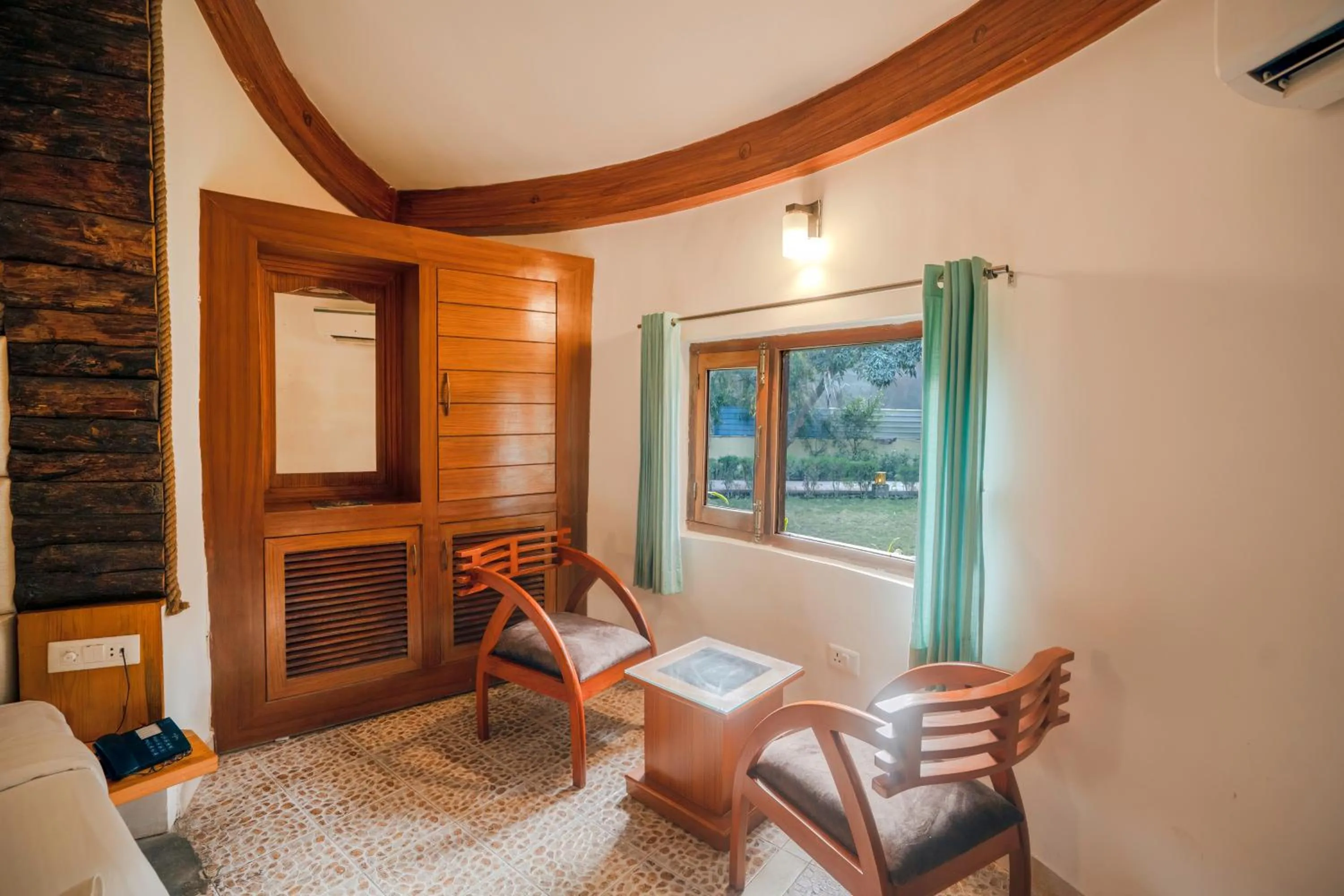 Seating area in La Perle River Resort By Excel Hotels & Resorts