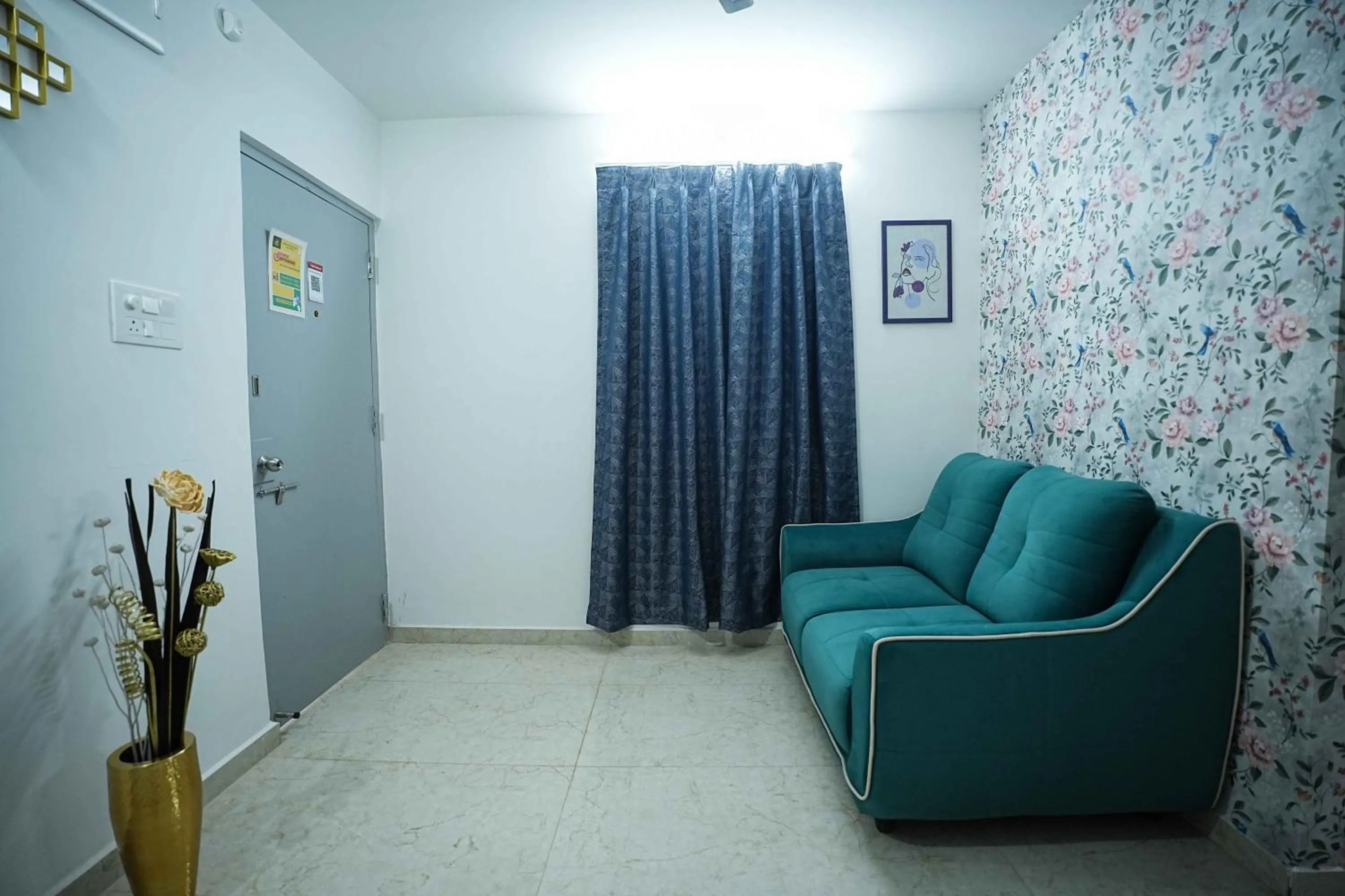 Living room in Yellow Bells Studios And Suites