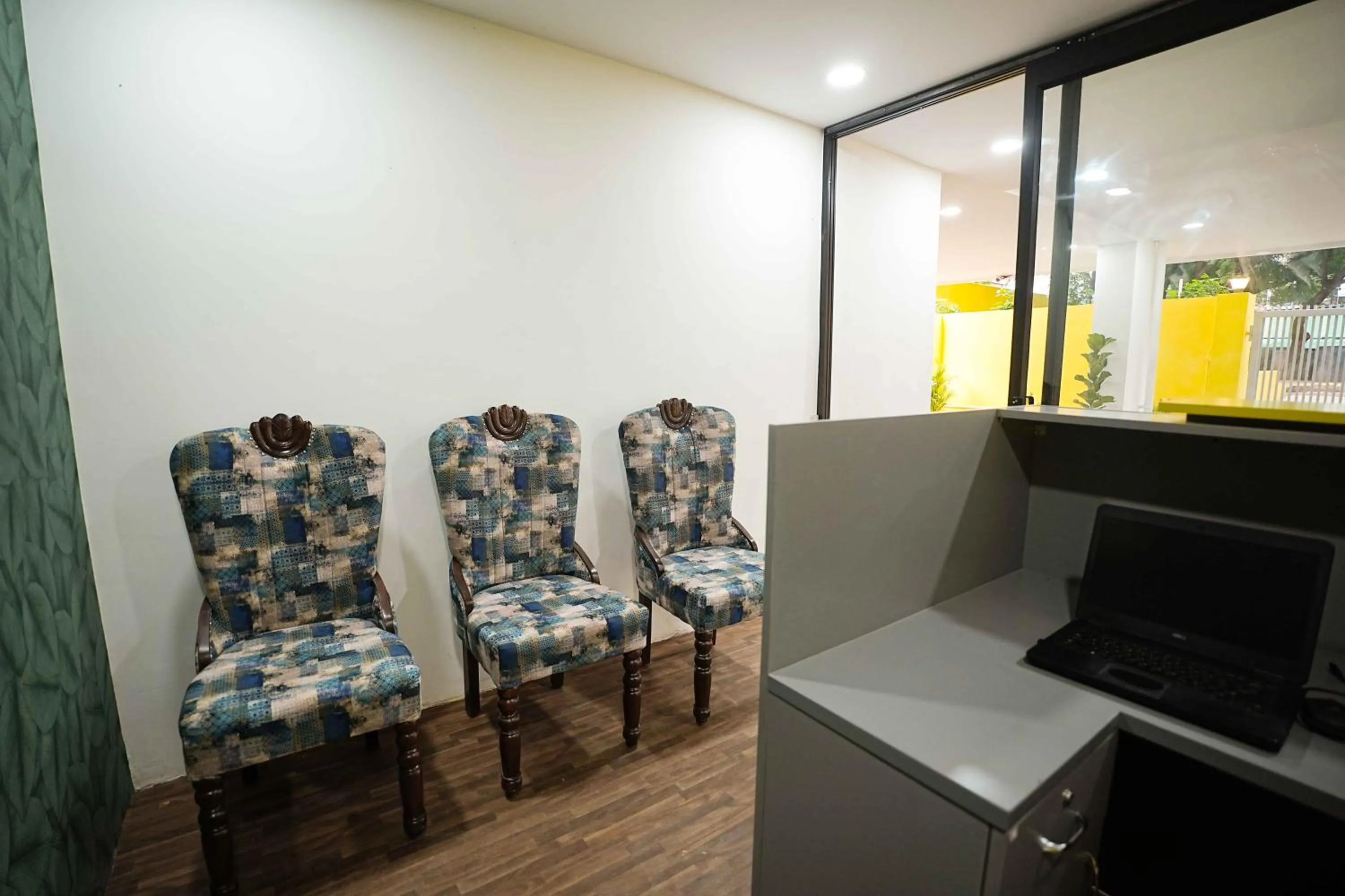 Seating area in Yellow Bells Studios And Suites