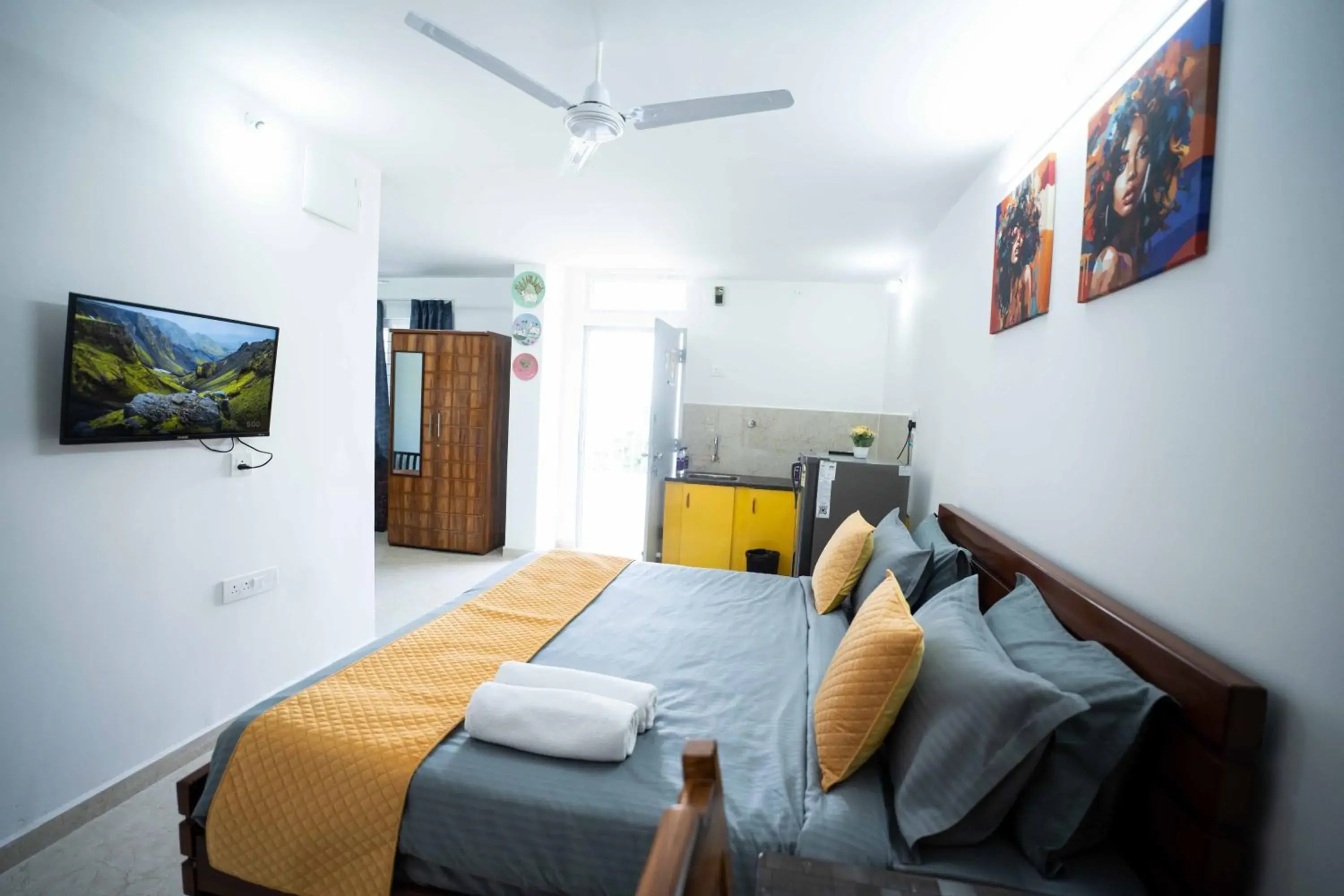 Photo of the whole room, Bed in Yellow Bells Studios And Suites Photo of the whole room, Bed in Yellow Bells Studios And Suites