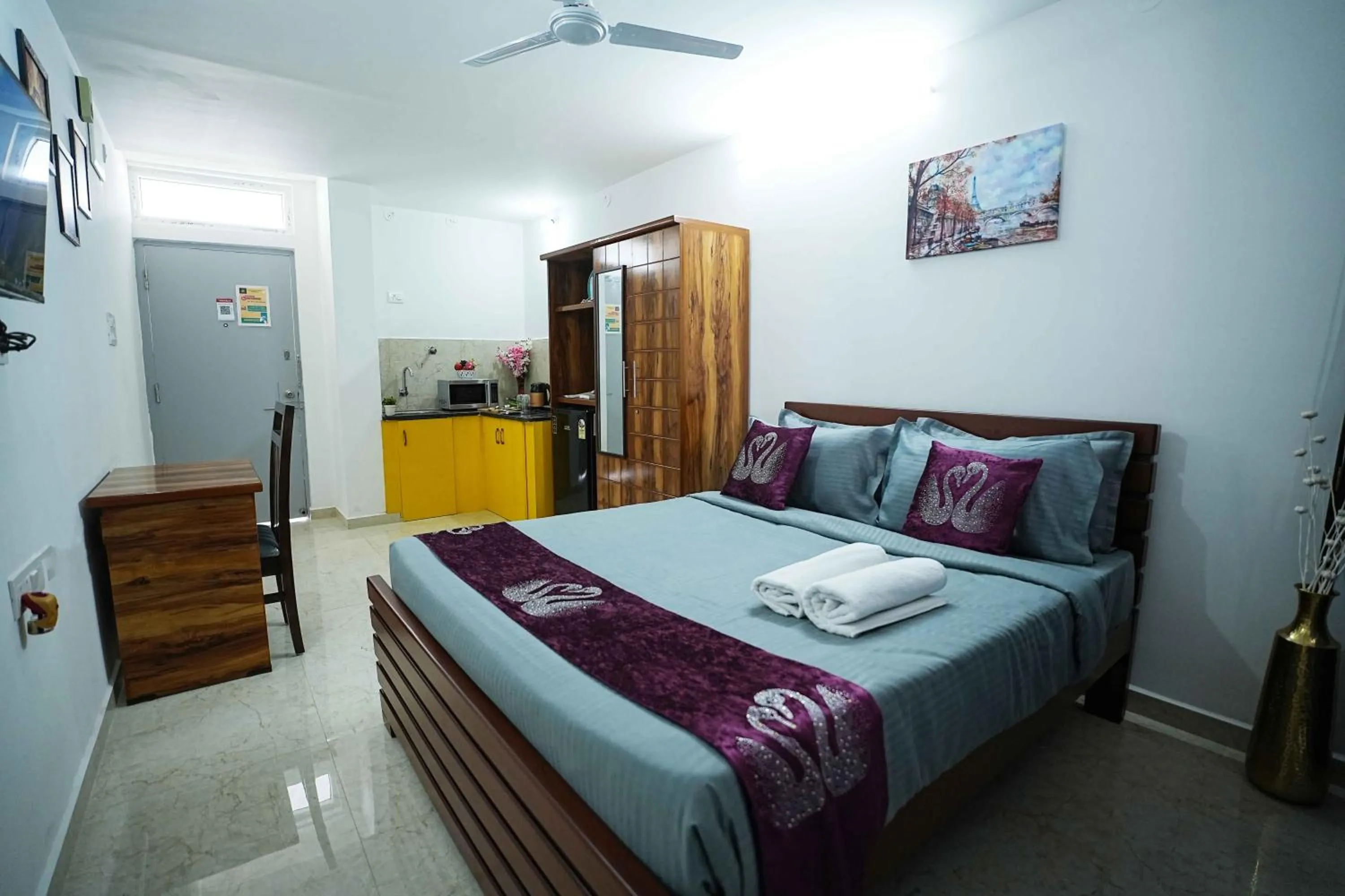 Photo of the whole room, Bed in Yellow Bells Studios And Suites