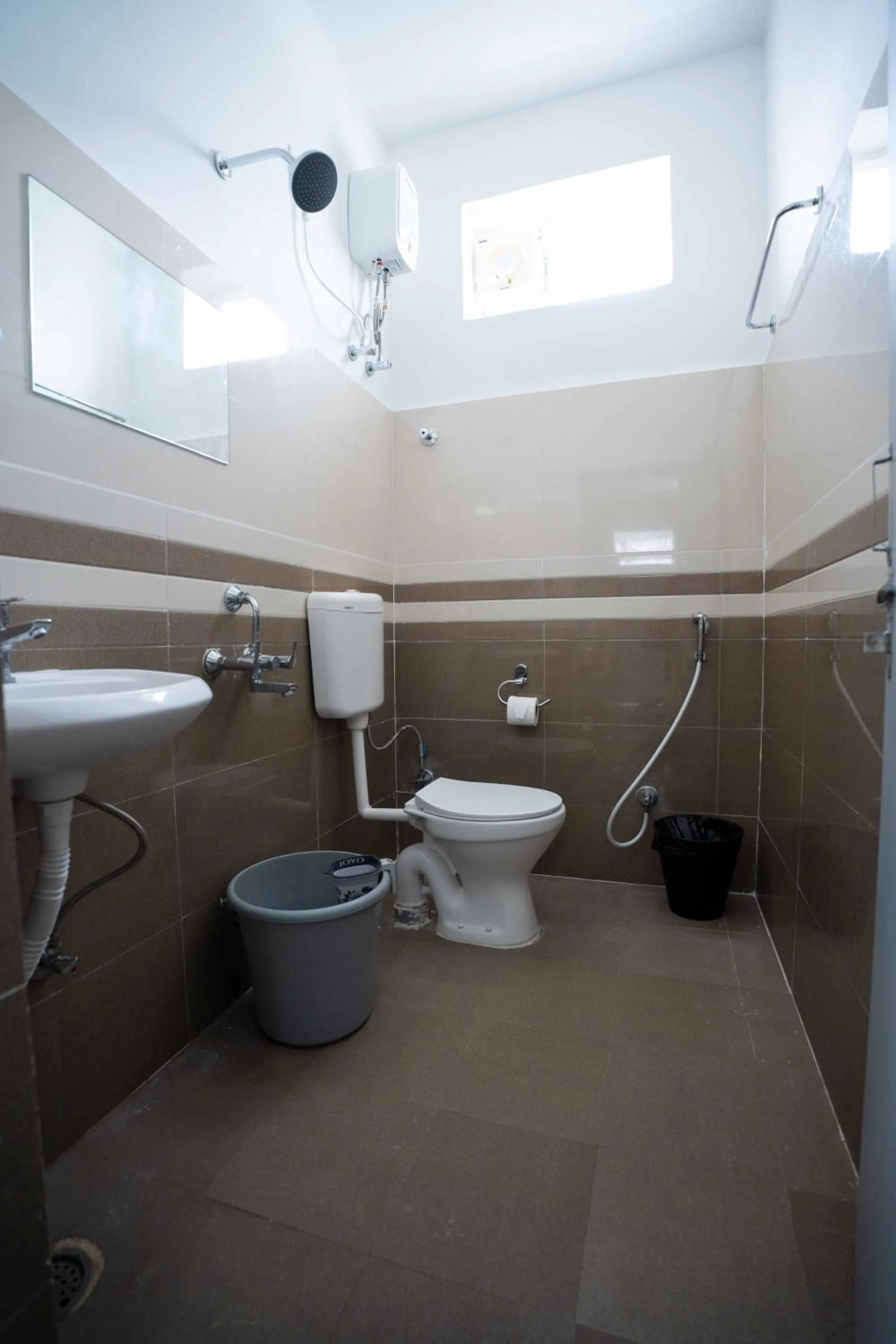 Bathroom in Yellow Bells Studios And Suites