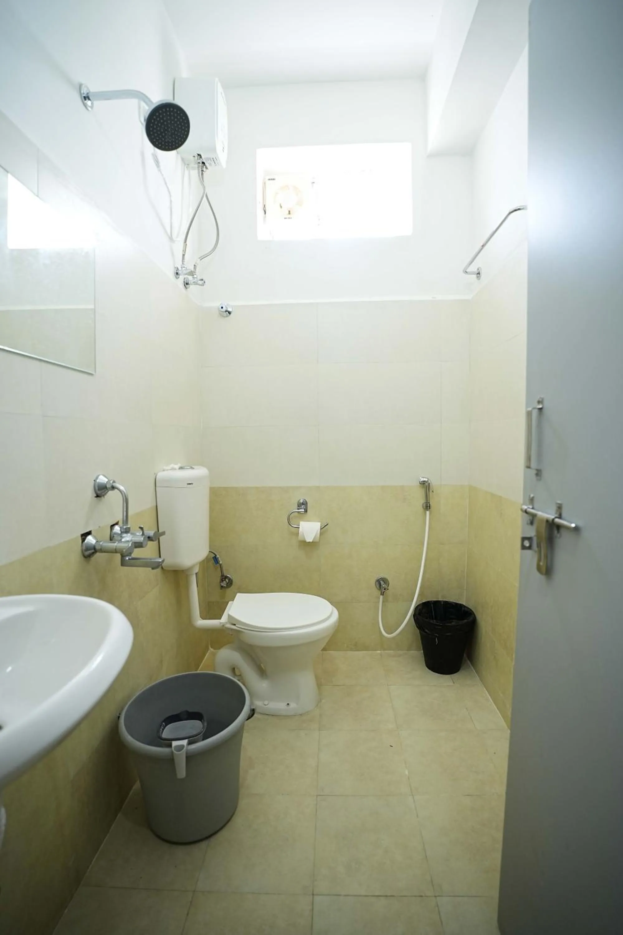 Shower in Yellow Bells Studios And Suites