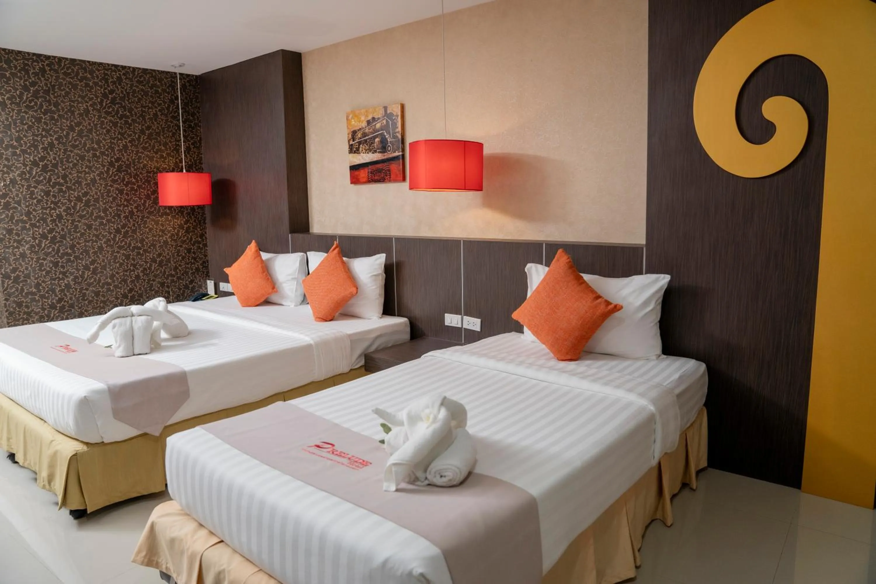 Bed in Prelude Hotel