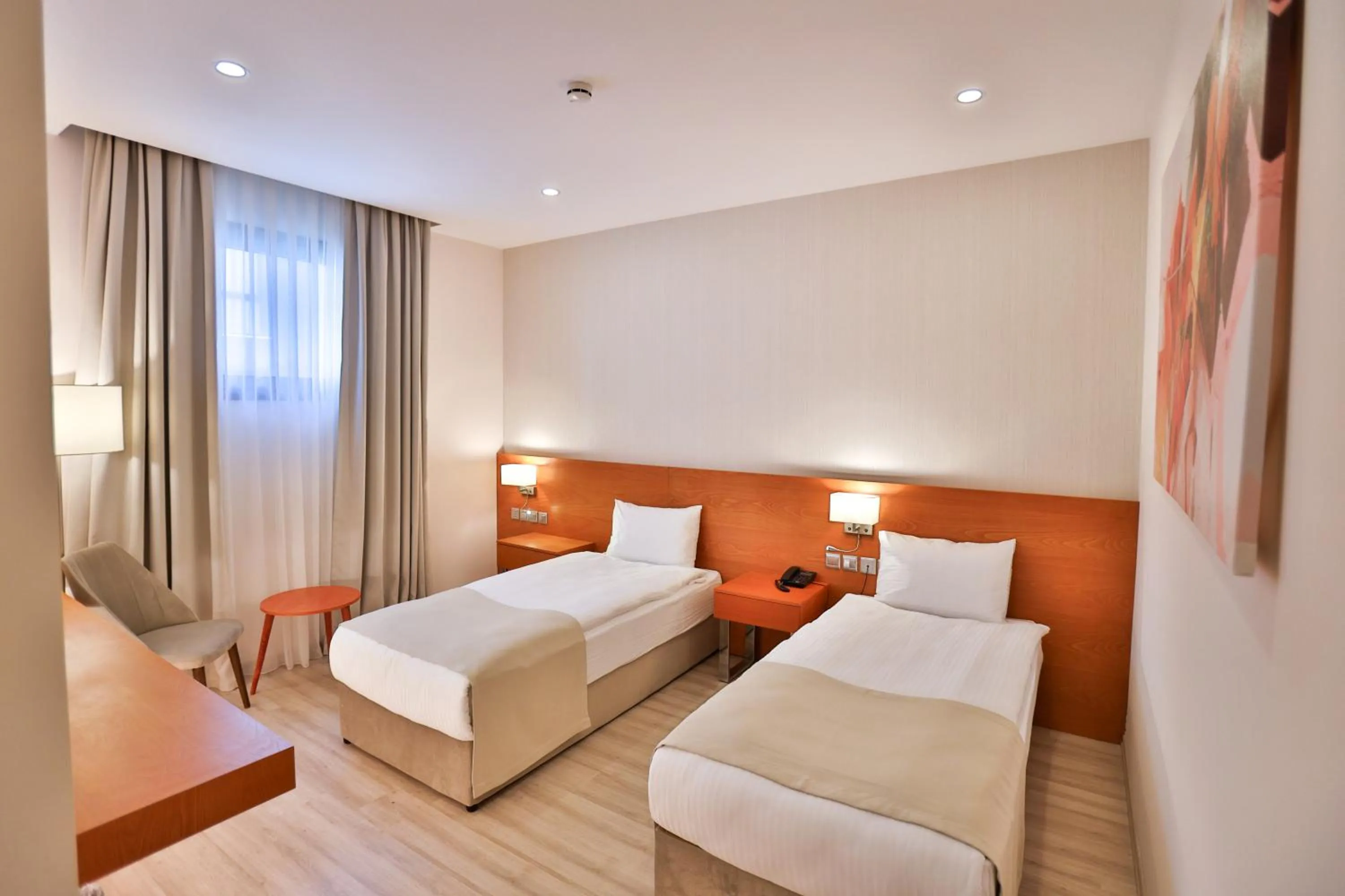 Bed in Caddem Inn Hotel