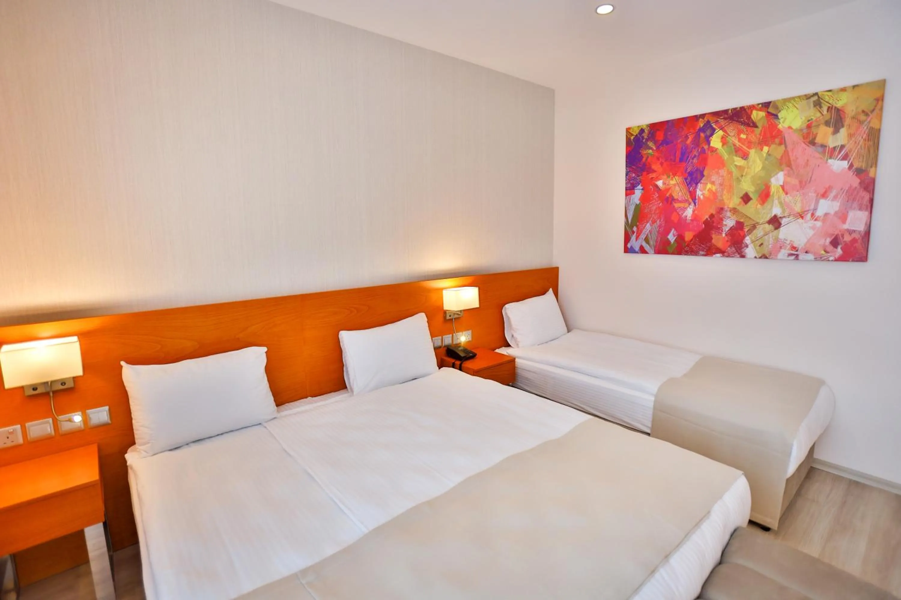 Bed in Caddem Inn Hotel