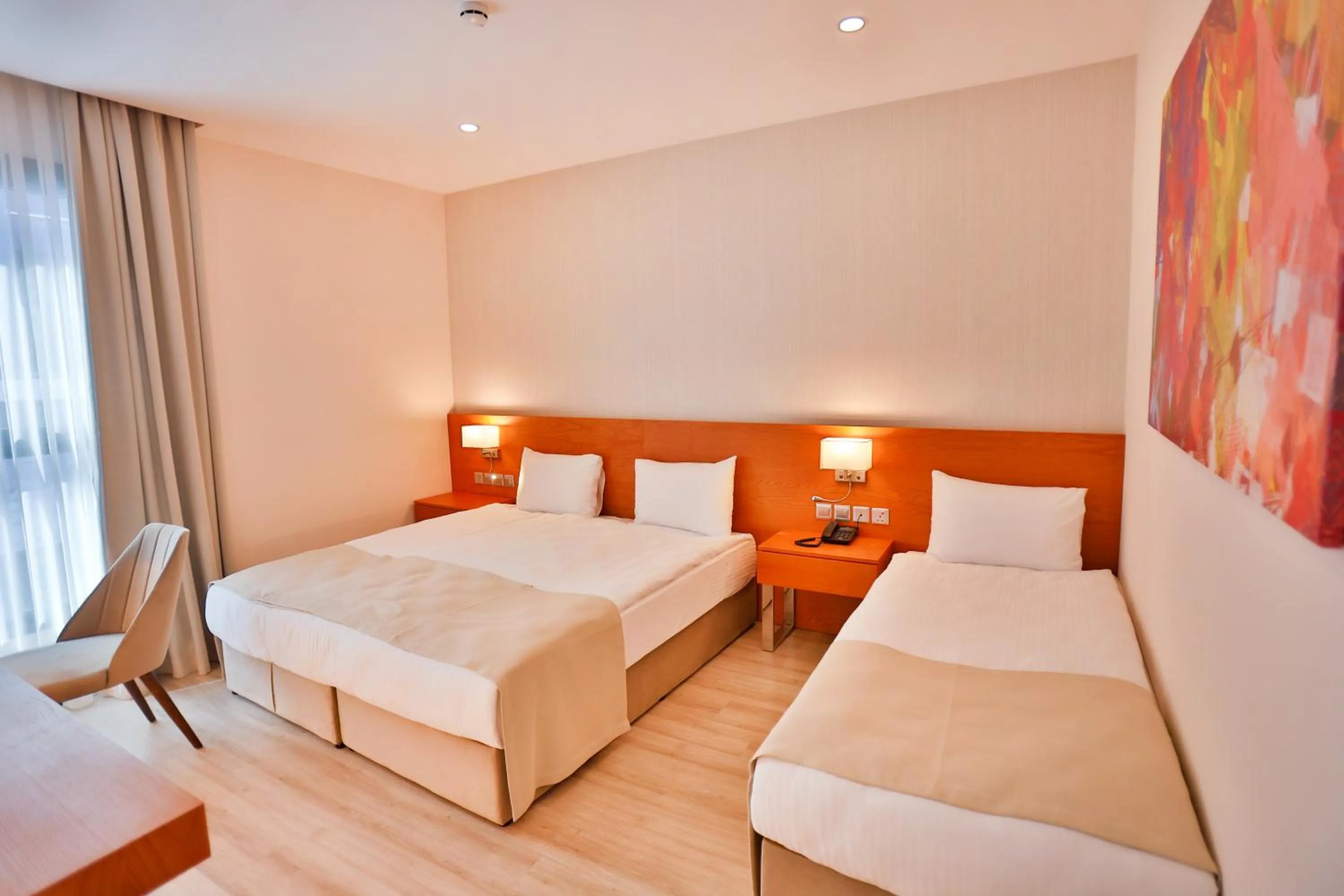 Bed in Caddem Inn Hotel