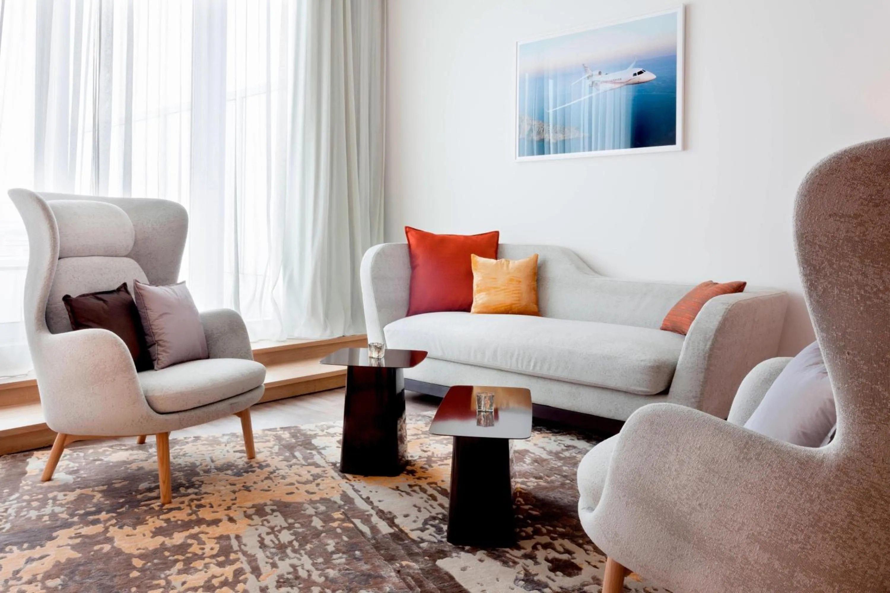 Living room in AC Hotel by Marriott Paris Le Bourget Airport