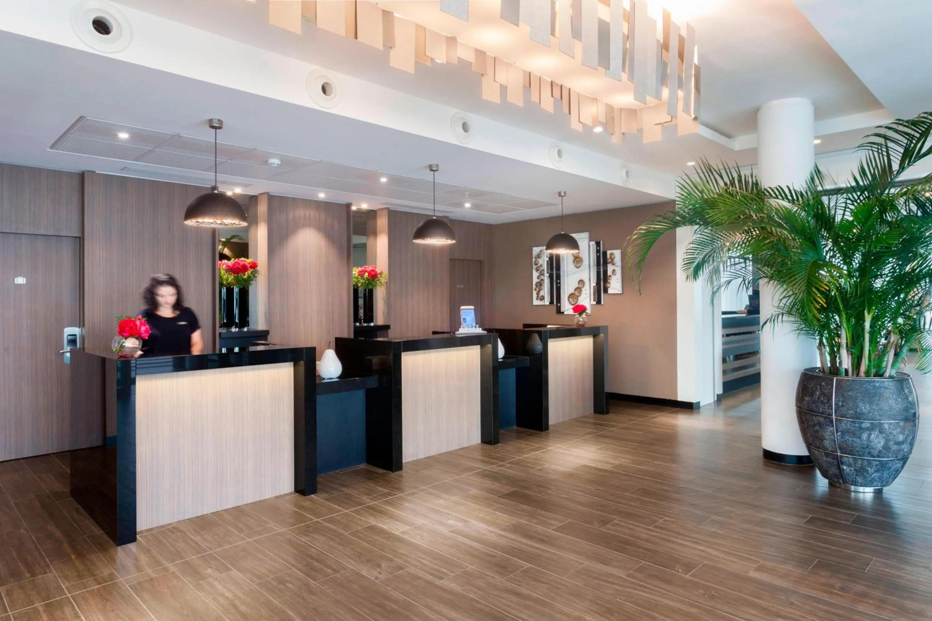 Lobby or reception in AC Hotel by Marriott Paris Le Bourget Airport