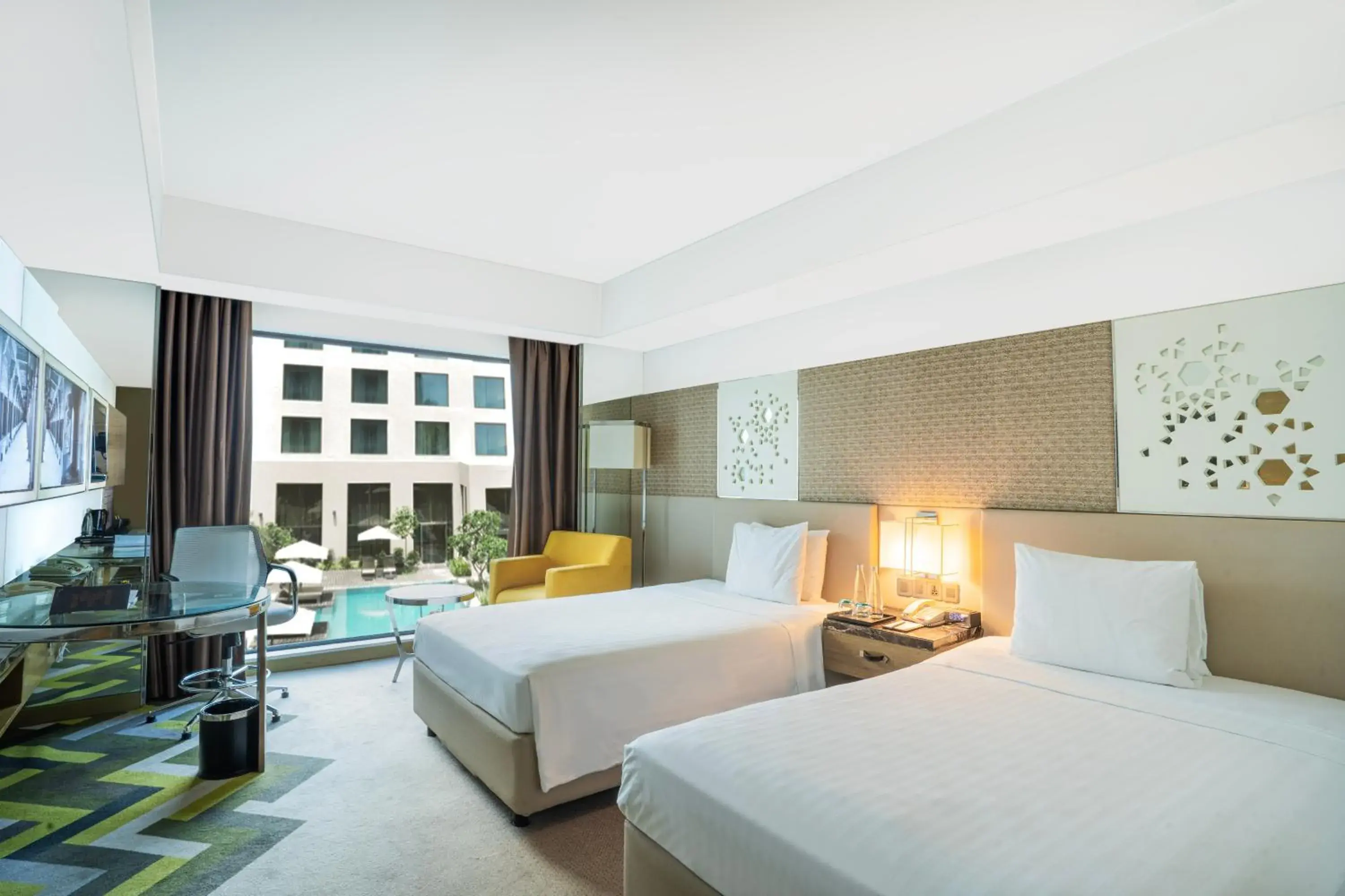 Twin Room with Pool View with INR 500 F&B credit, 1+1 Happy Hours (selected brands) and 15% discount on Spa in Courtyard by Marriott Agra Twin Room with Pool View with INR 500 F&B credit, 1+1 Happy Hours (selected brands) and 15% discount on Spa in Courtyard by Marriott Agra