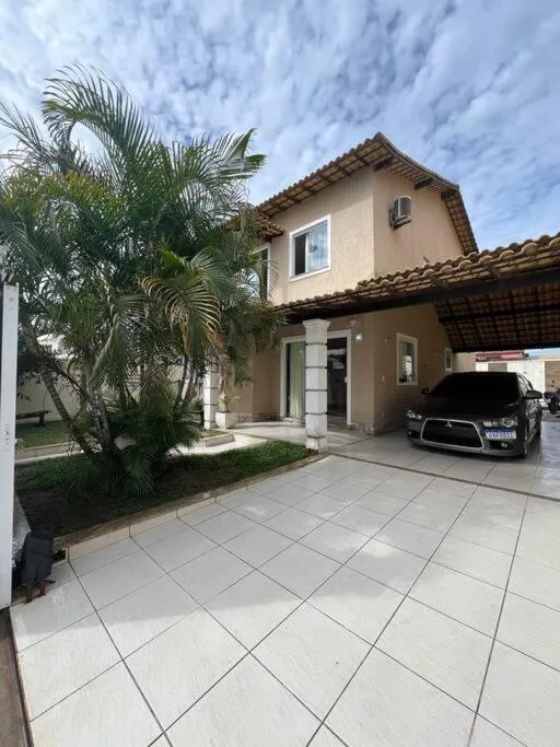 Casa com piscina, churrasqueira e ar condicionado em condomínio