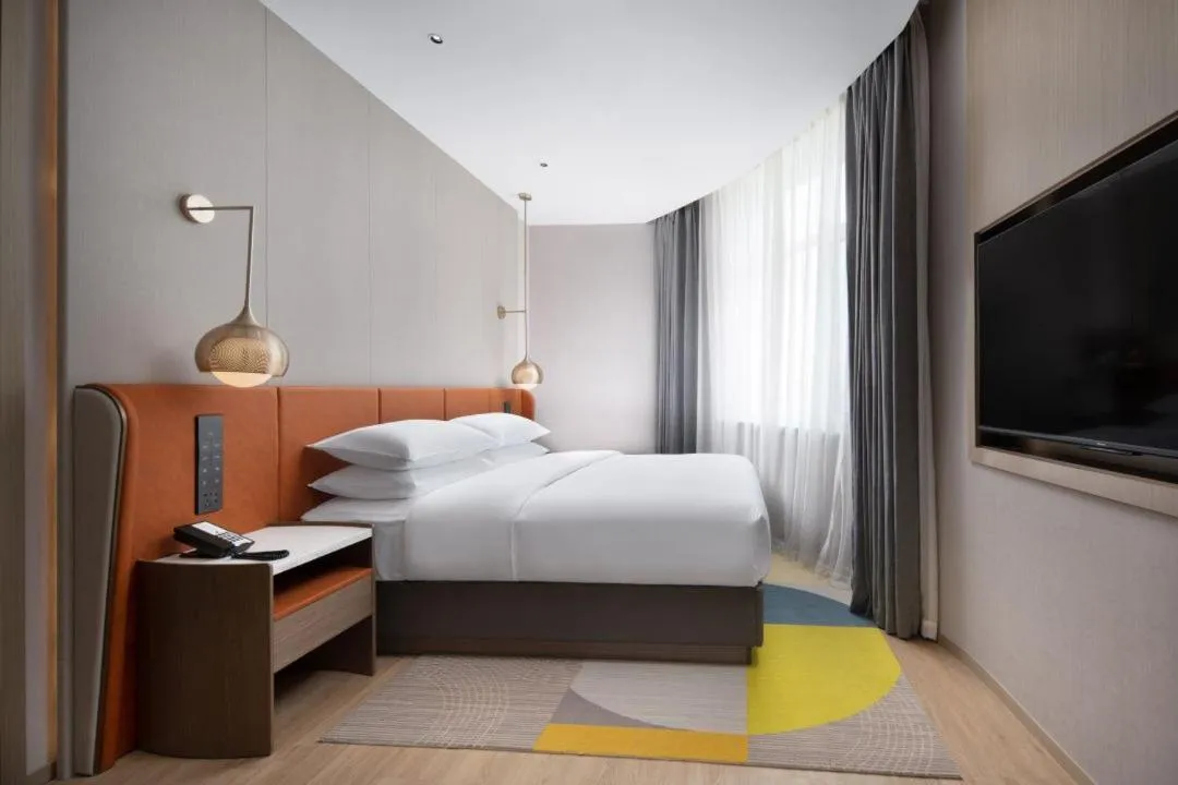 Bed in Home2 Suite by Hilton Yantai Laishan