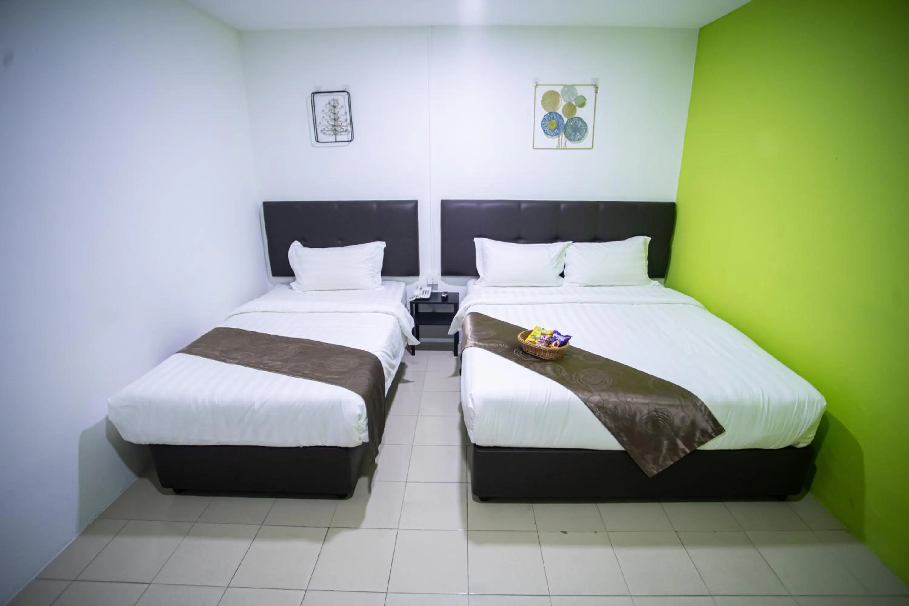 Bed in Rex City Hotel