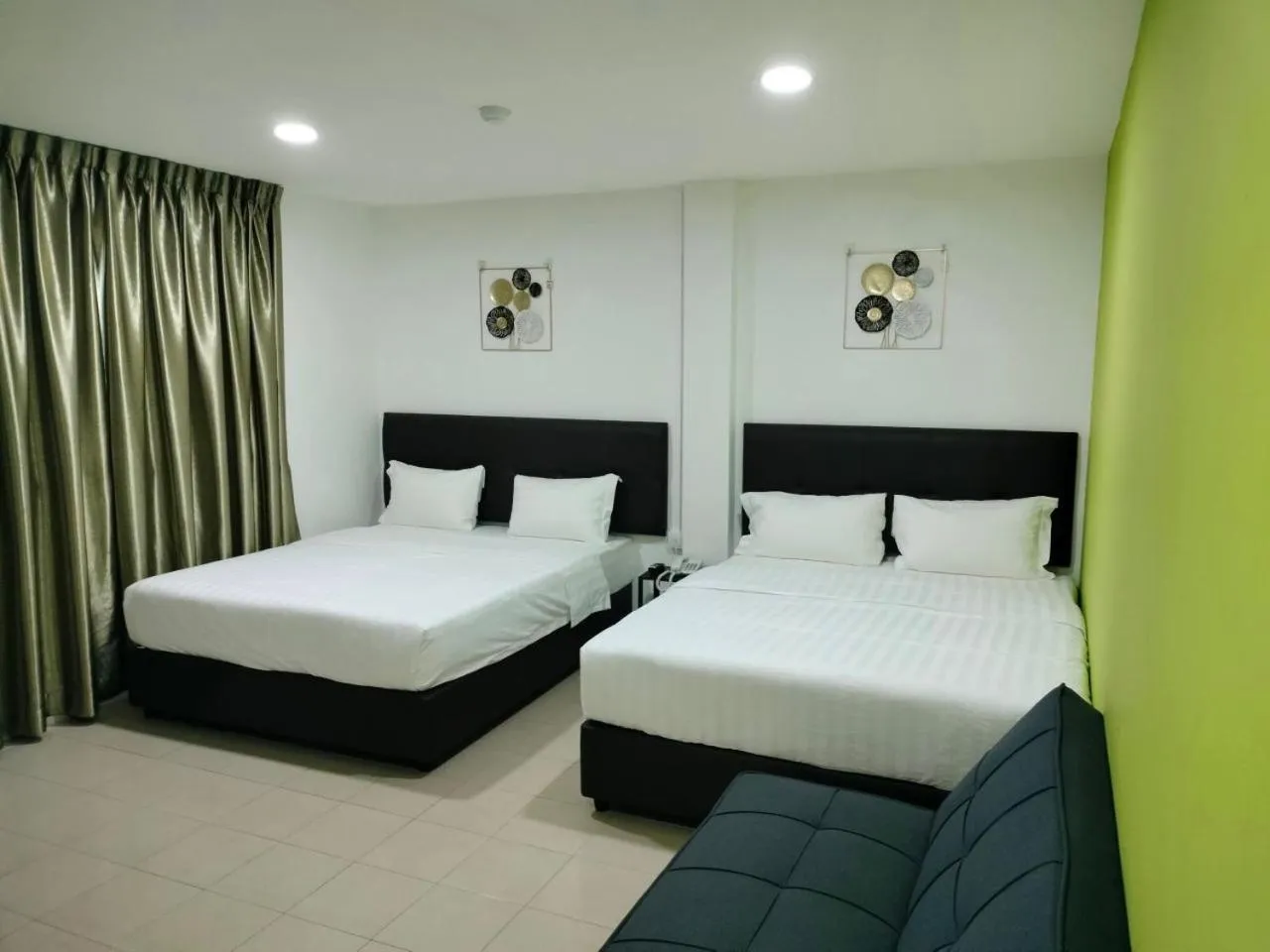 Bed in Rex City Hotel