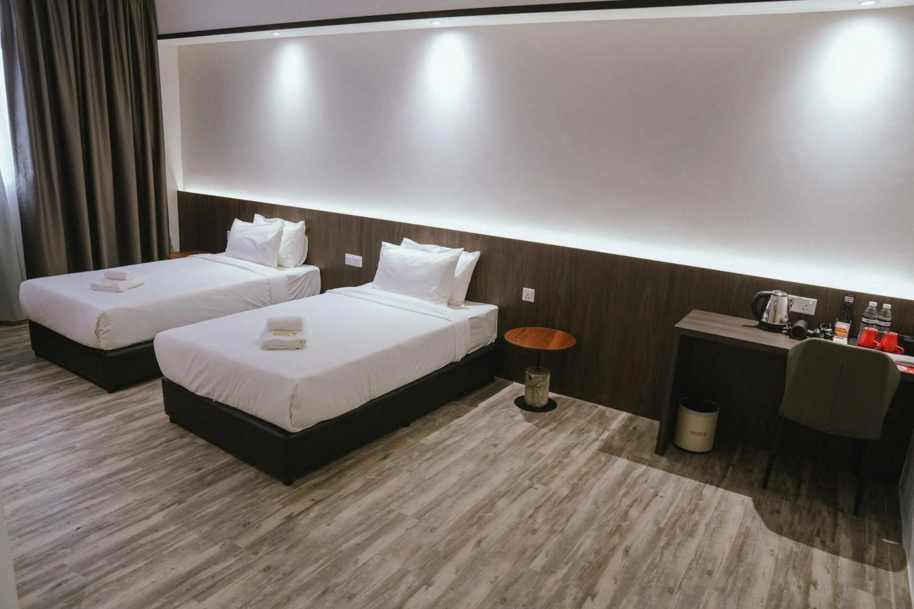 Bed in Roxy Hotel Siniawan