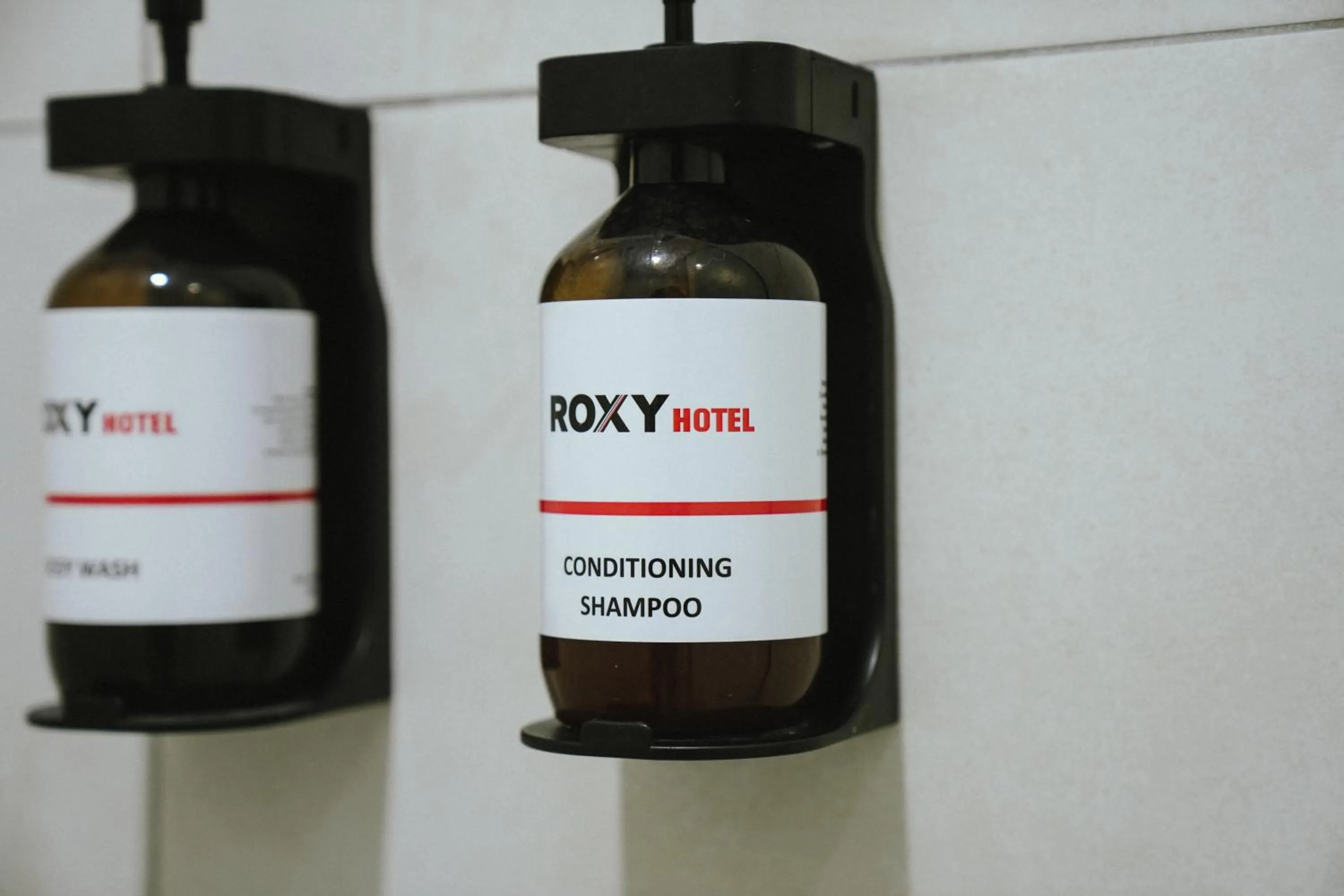 Property logo or sign in Roxy Hotel Siniawan