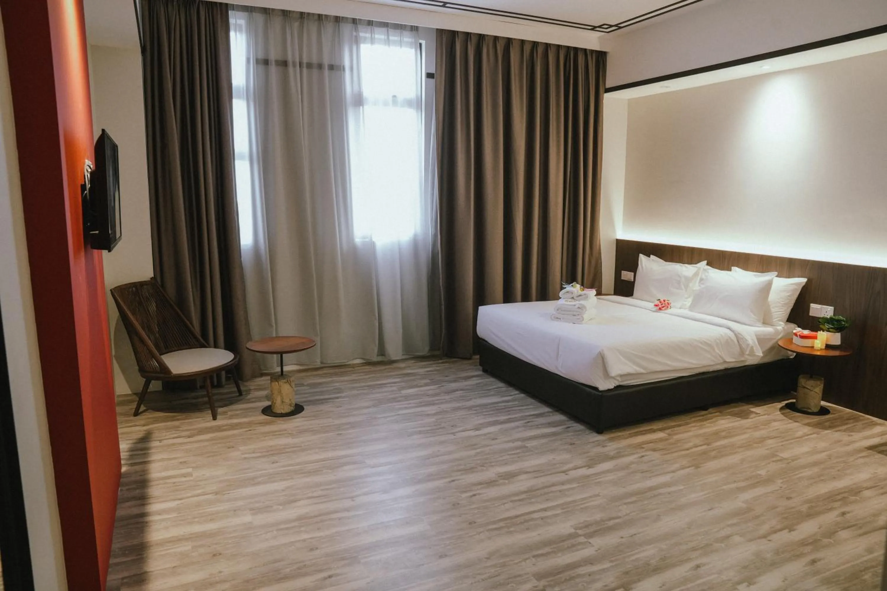 Bed in Roxy Hotel Siniawan