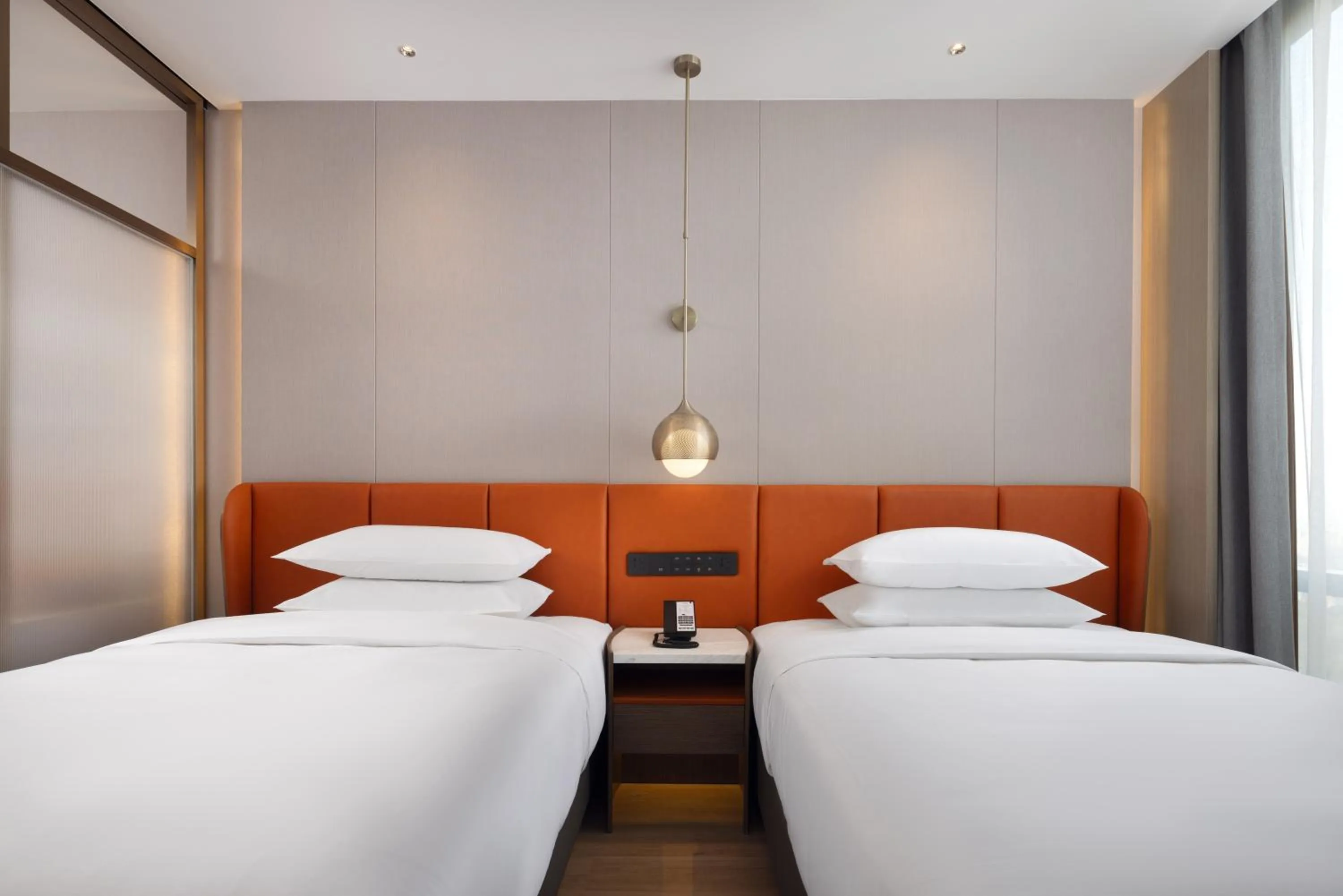 Bed in Home2 Suite by Hilton Jingjiang Binjiang New Town