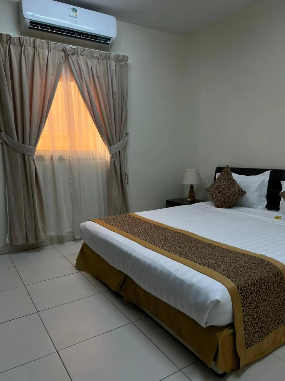 Photo of the whole room, Bed in Binayat Hama Serviced Apartments