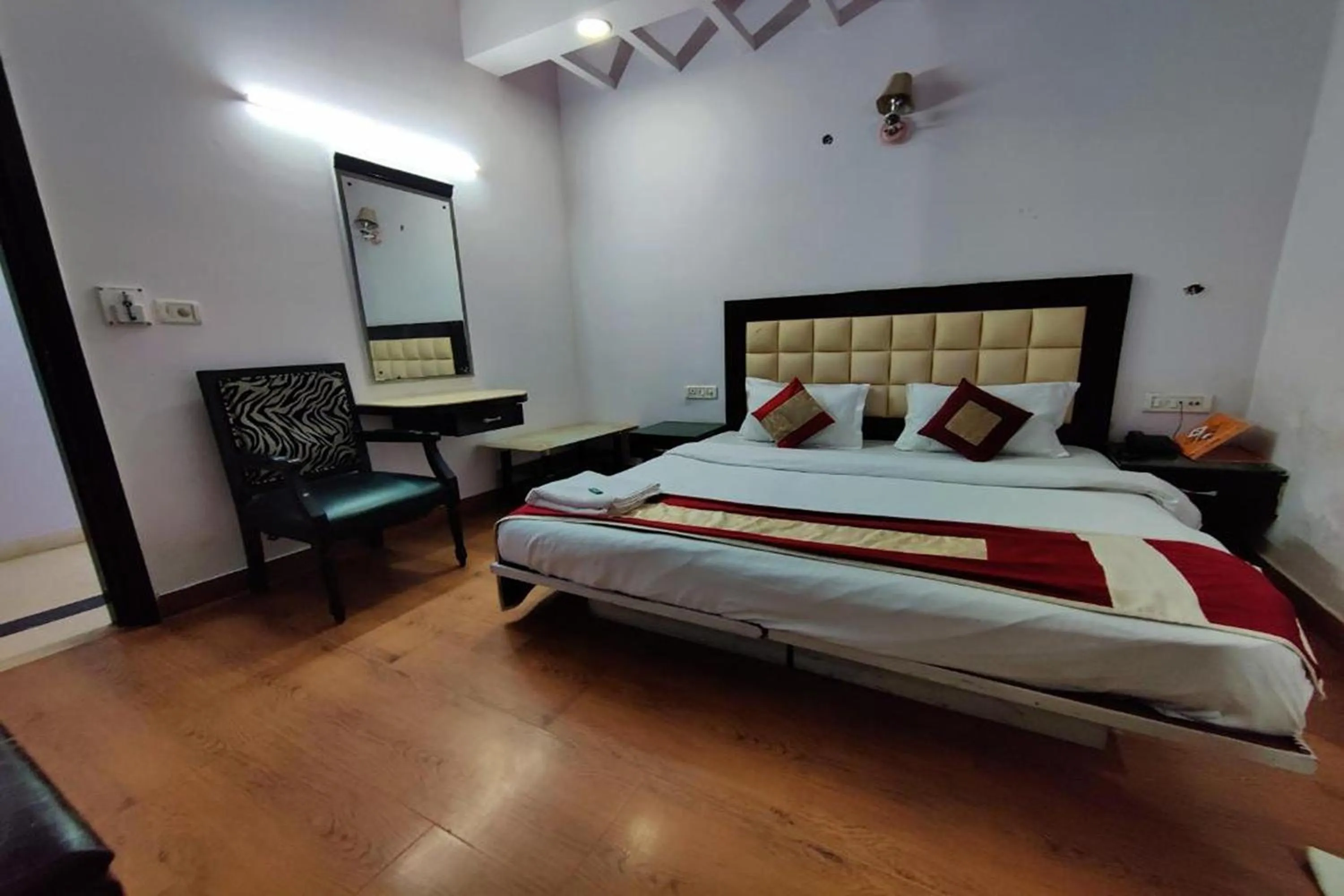 Bed in Hotel Asko International