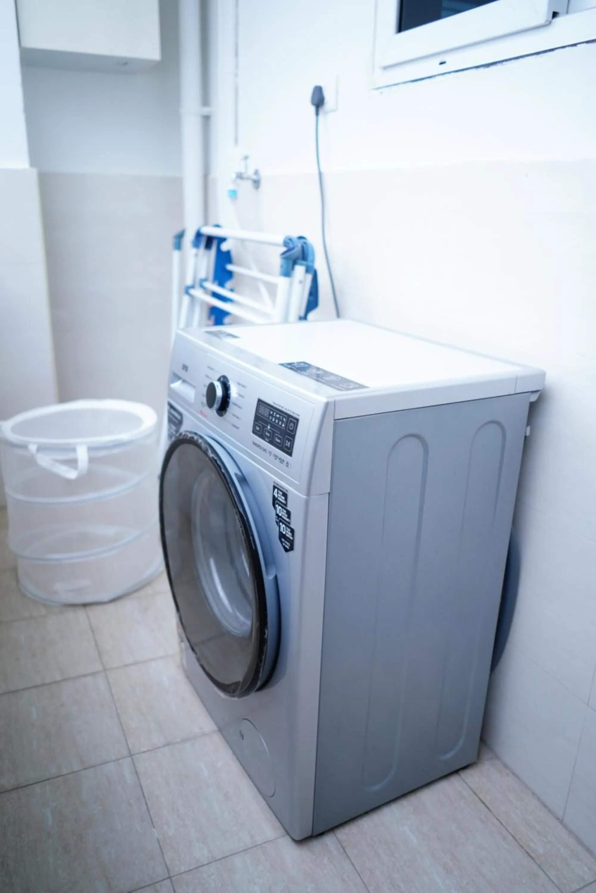 washing machine in Enkay Service Apartments