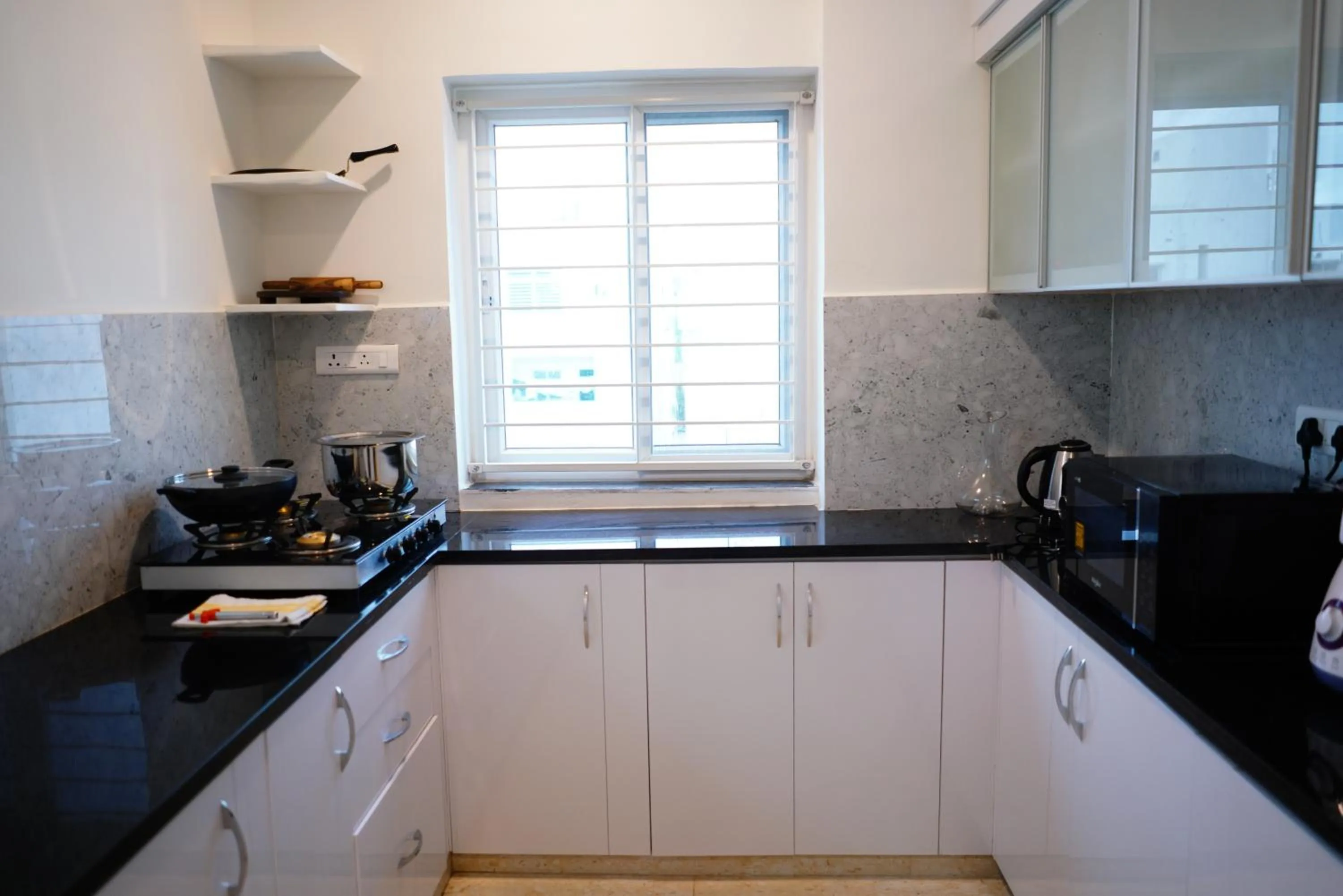 Kitchen or kitchenette in Enkay Service Apartments