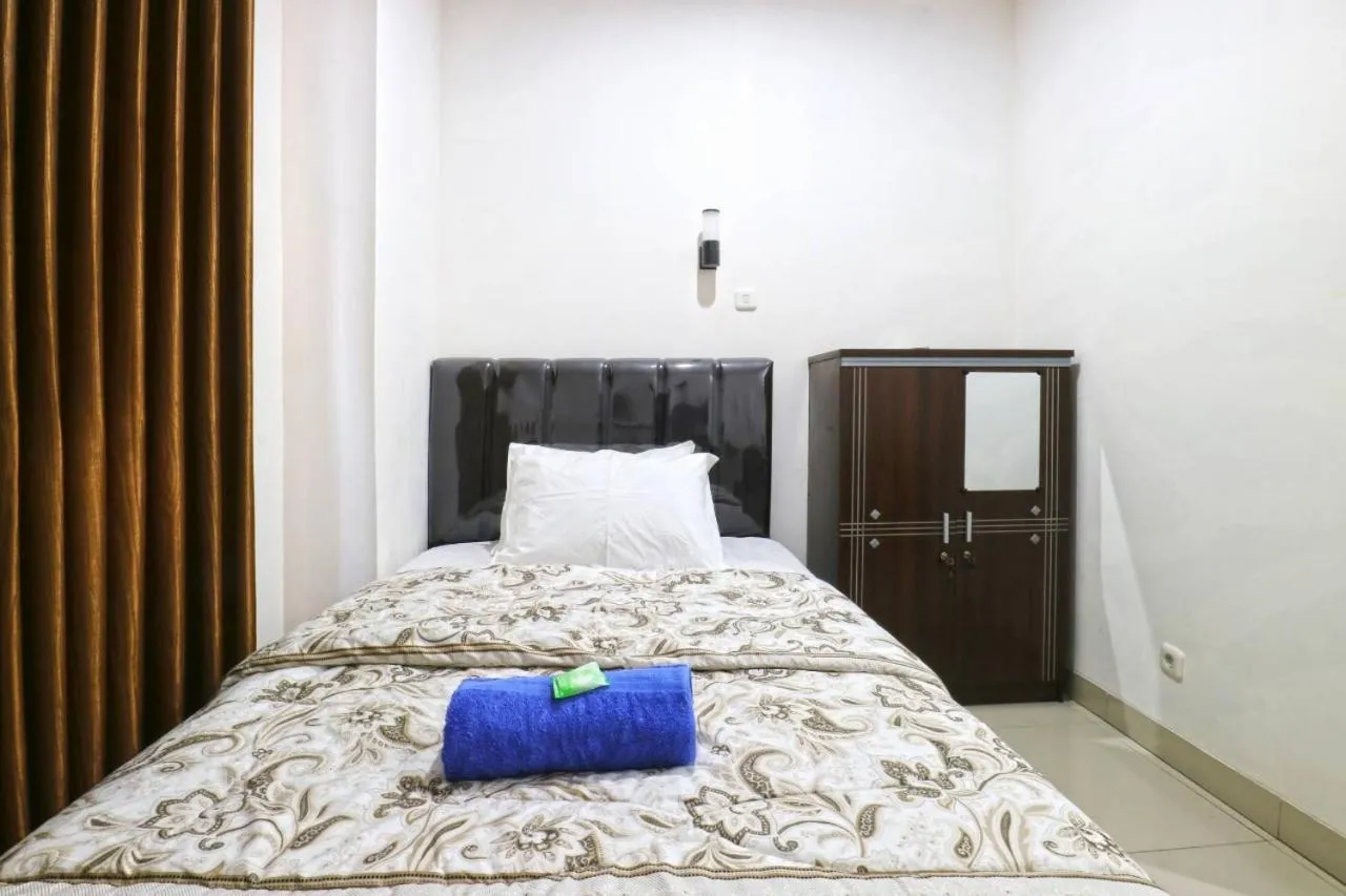 Bed in Saloka Guest House & Residence