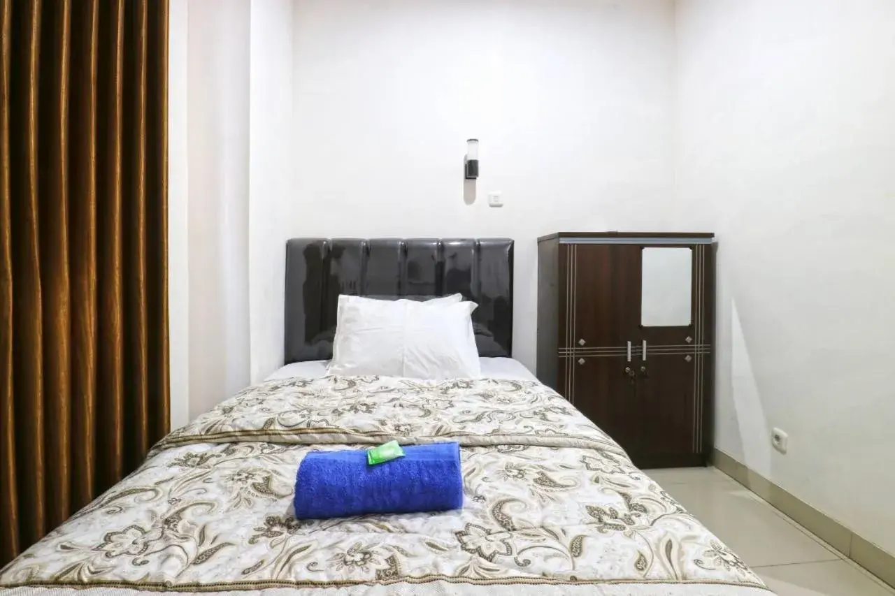 Bed in Saloka Guest House & Residence Bed in Saloka Guest House & Residence