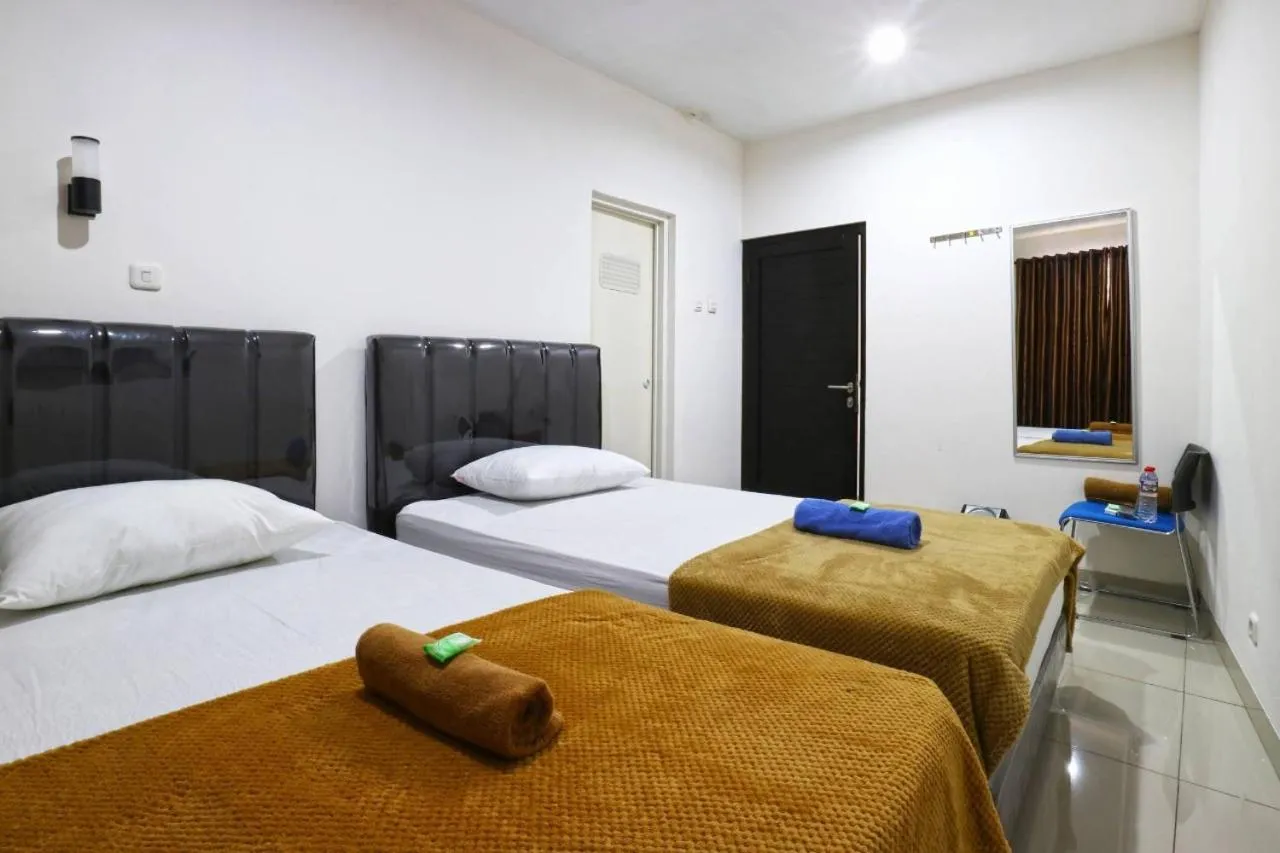 Bed in Saloka Guest House & Residence