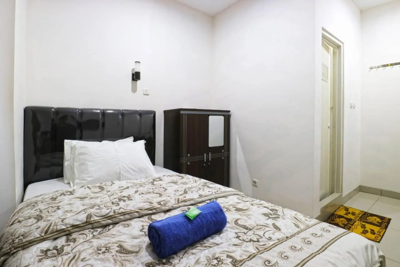 Bed in Saloka Guest House & Residence
