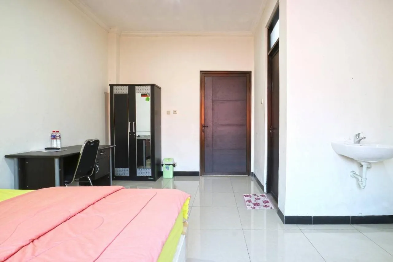 Bed in Saloka Guest House & Residence