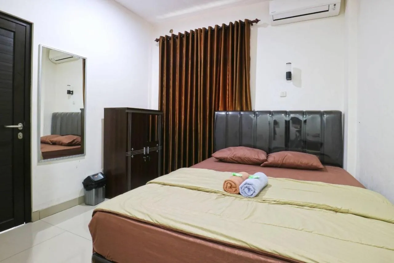 Bed in Saloka Guest House & Residence
