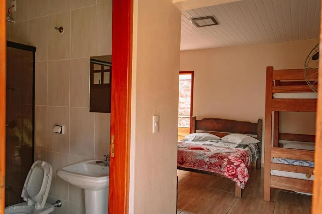 Bed in Pousada Natalino Broleze
