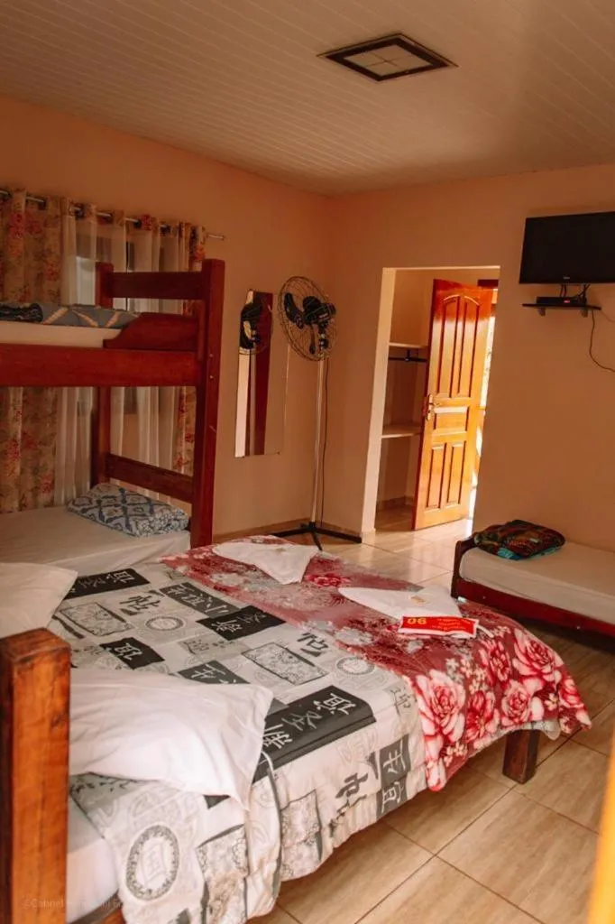 Bed in Pousada Natalino Broleze