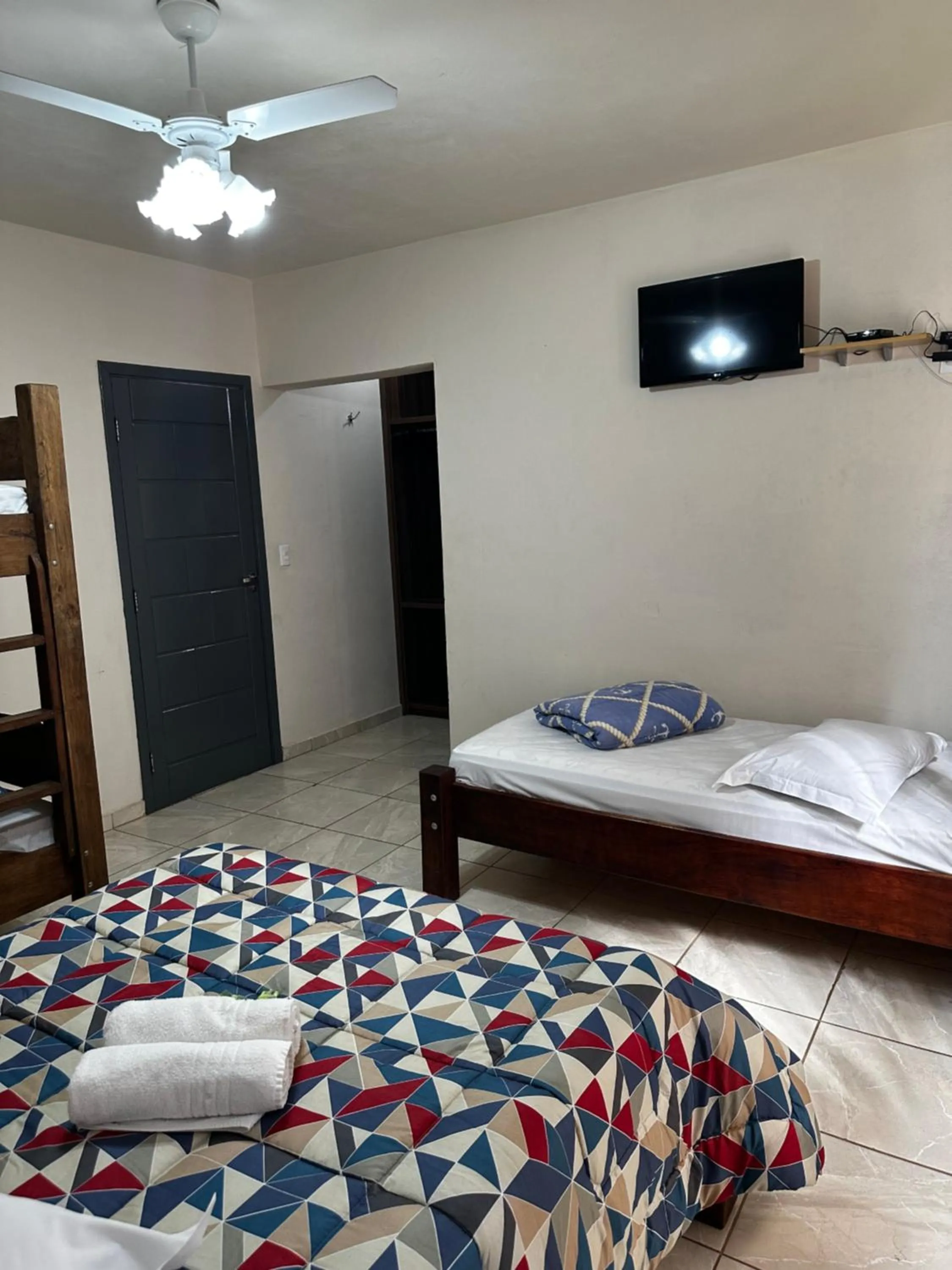 Bed in Pousada Natalino Broleze