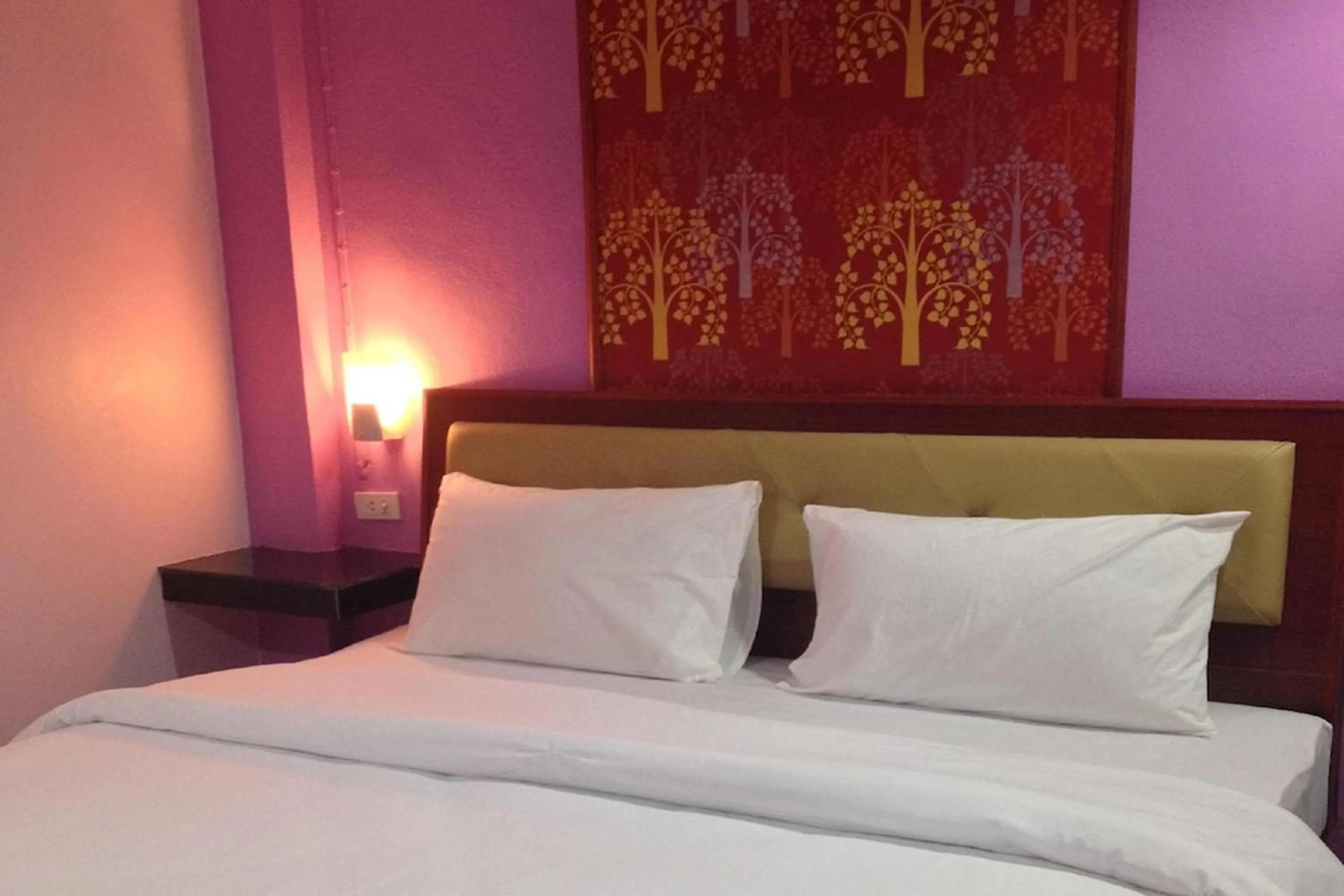 Bed in Krabi Orchid Hometel
