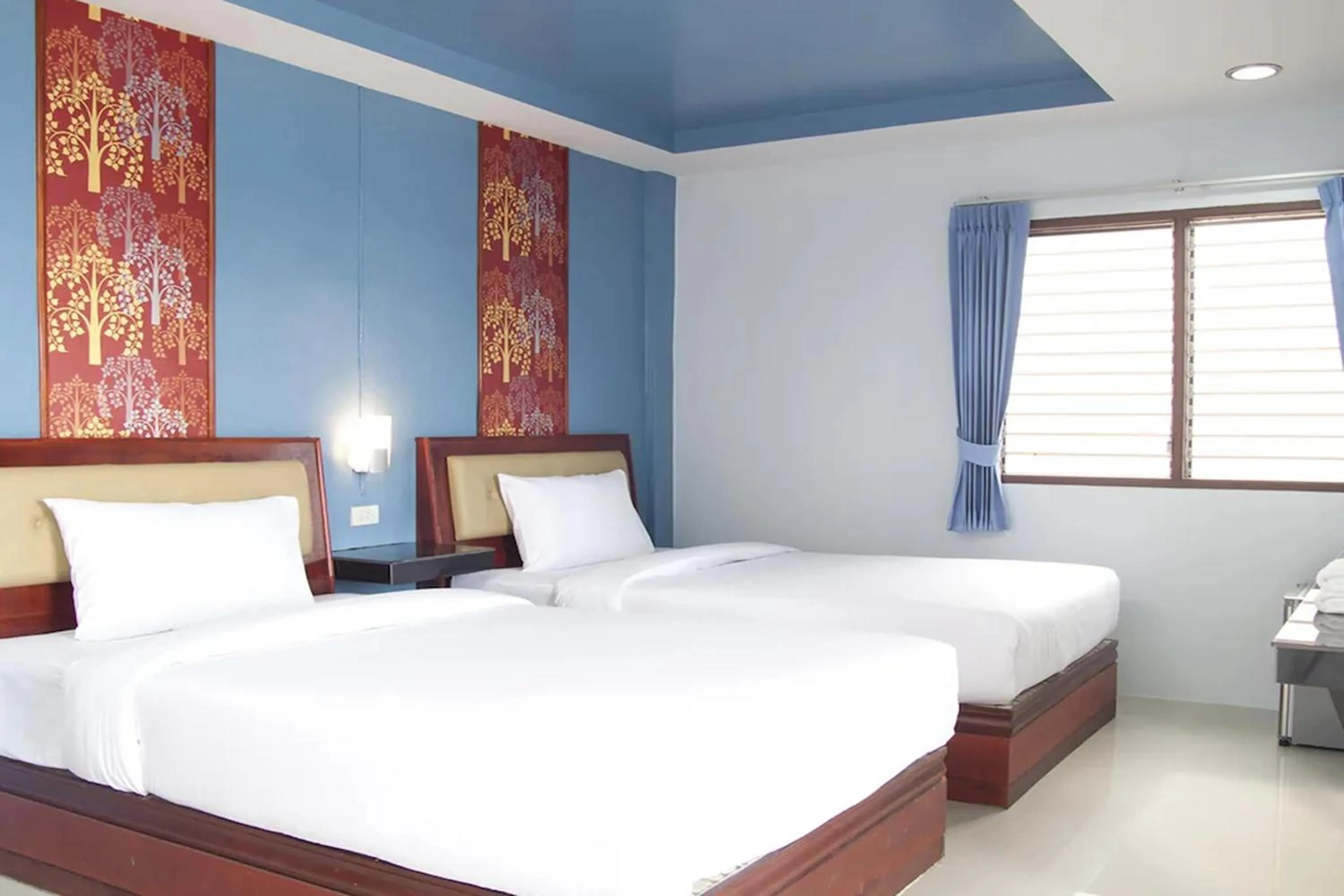 Bed in Krabi Orchid Hometel