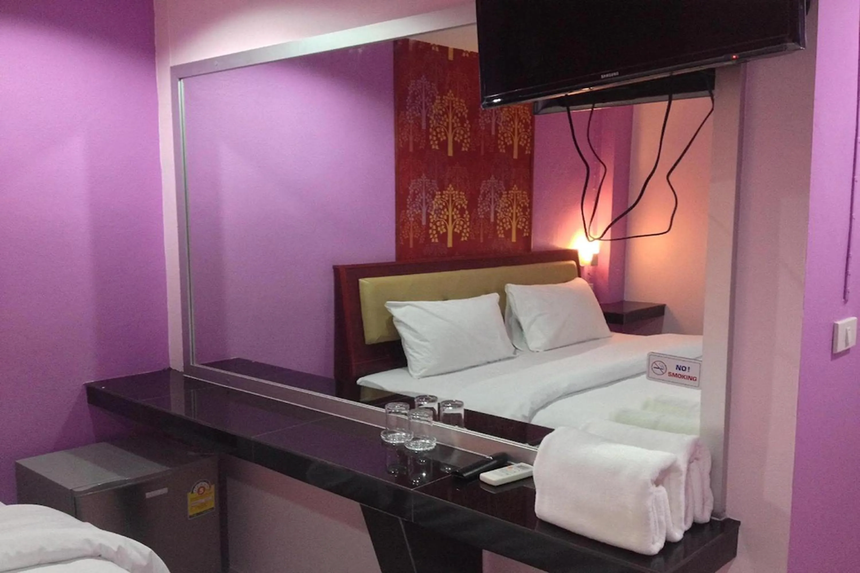 Bed in Krabi Orchid Hometel