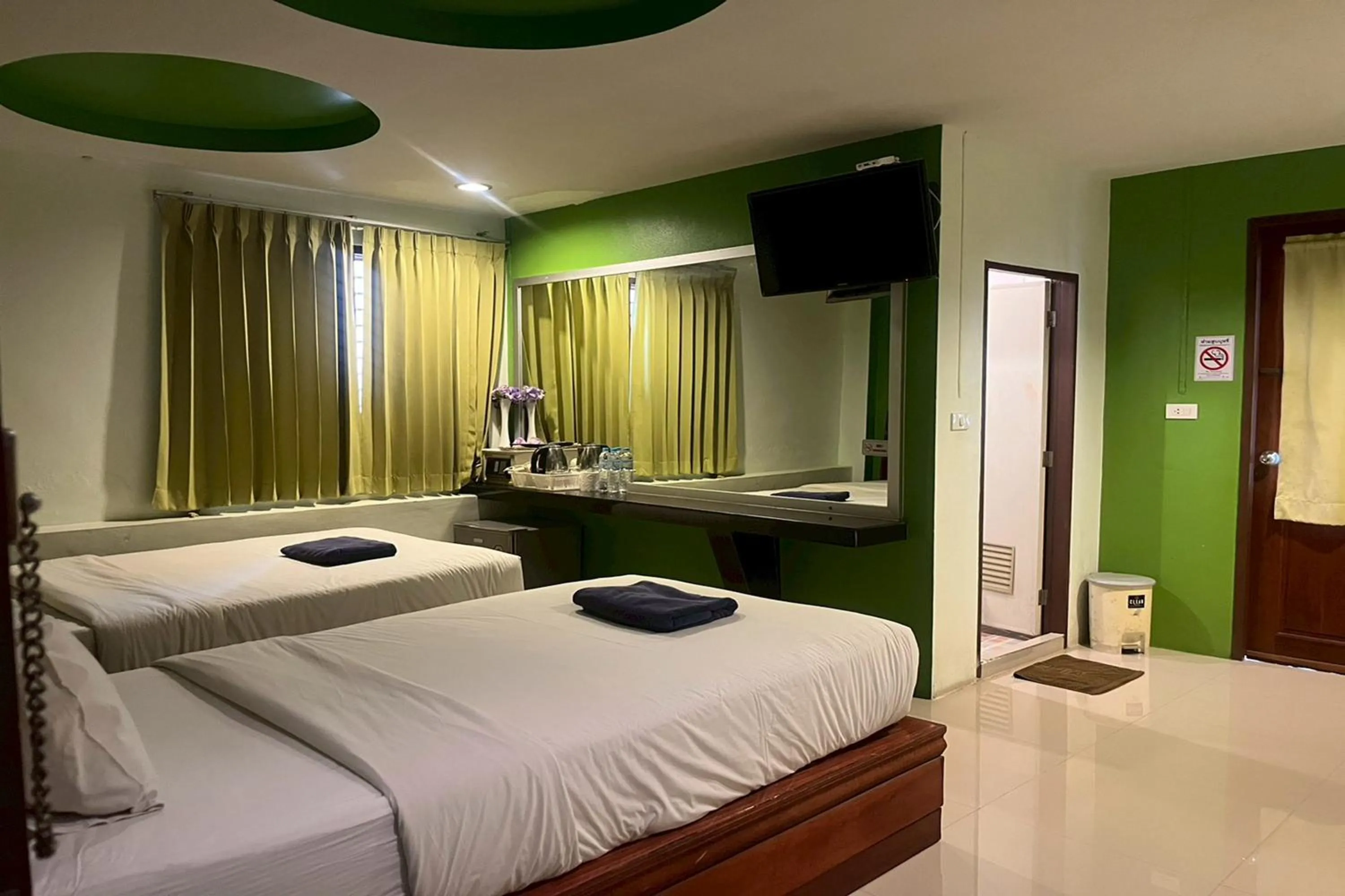 Bed in Krabi Orchid Hometel