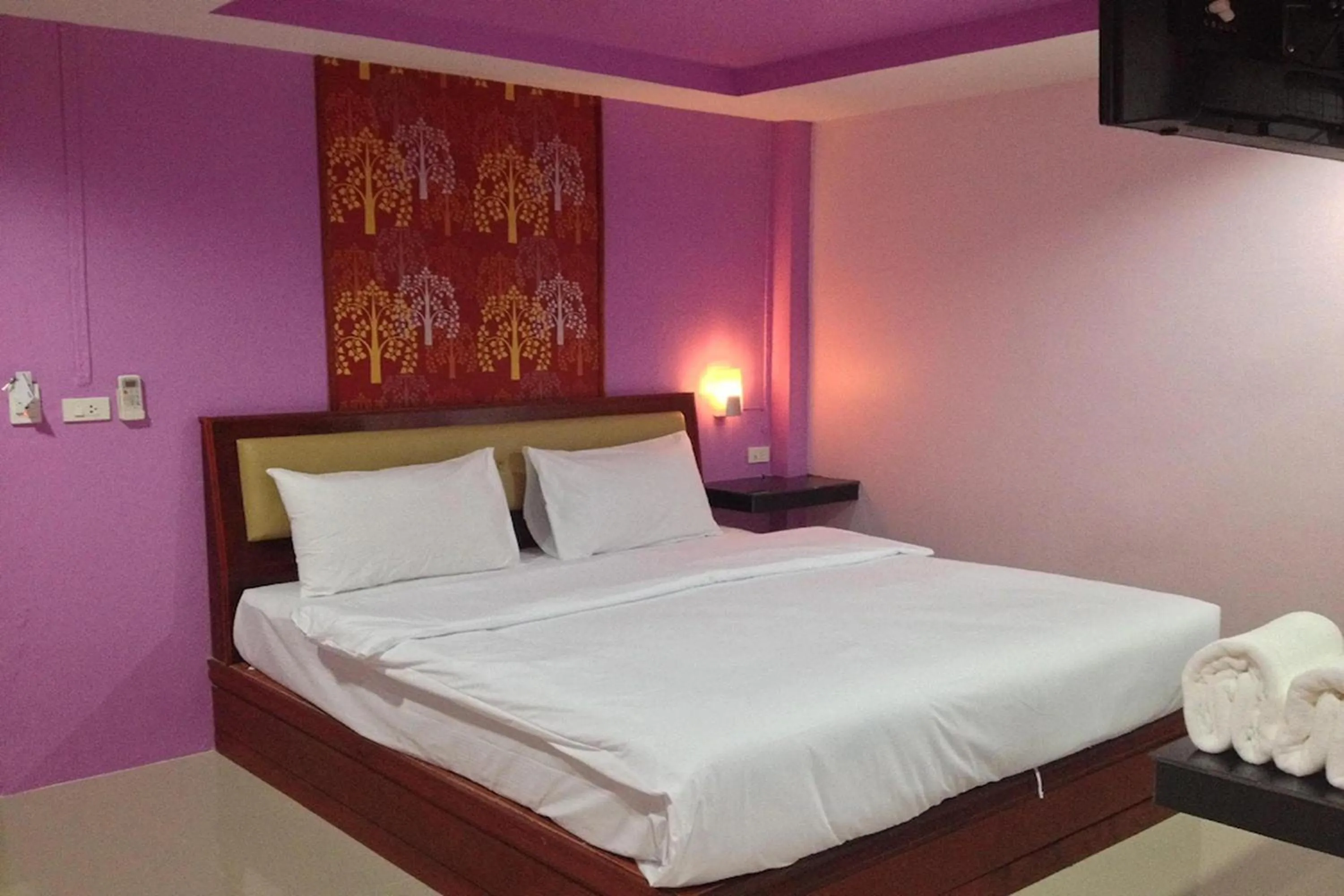 Bed in Krabi Orchid Hometel