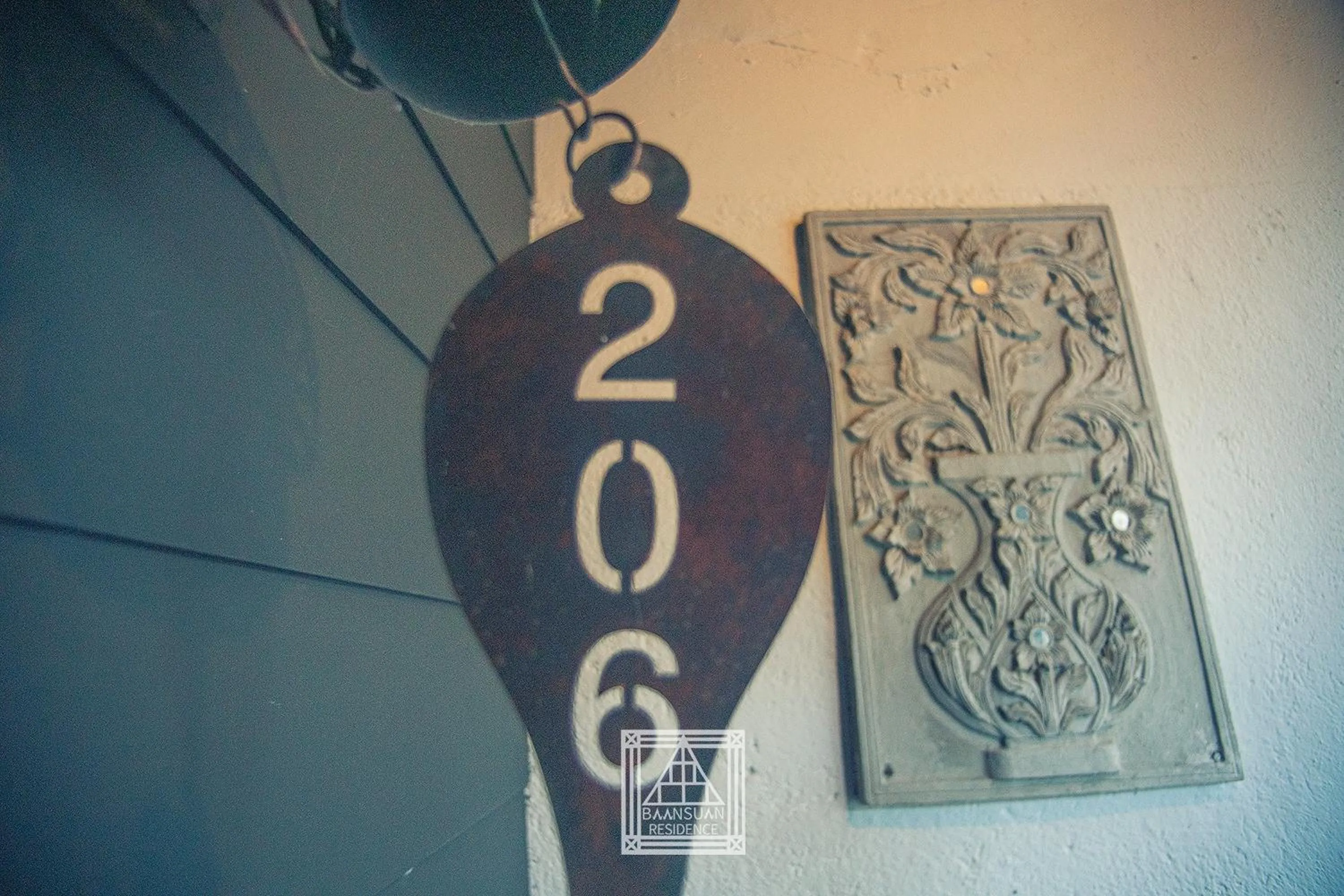 Text overlay in Baan Suan Residence เฮือนพักบ้านสวน