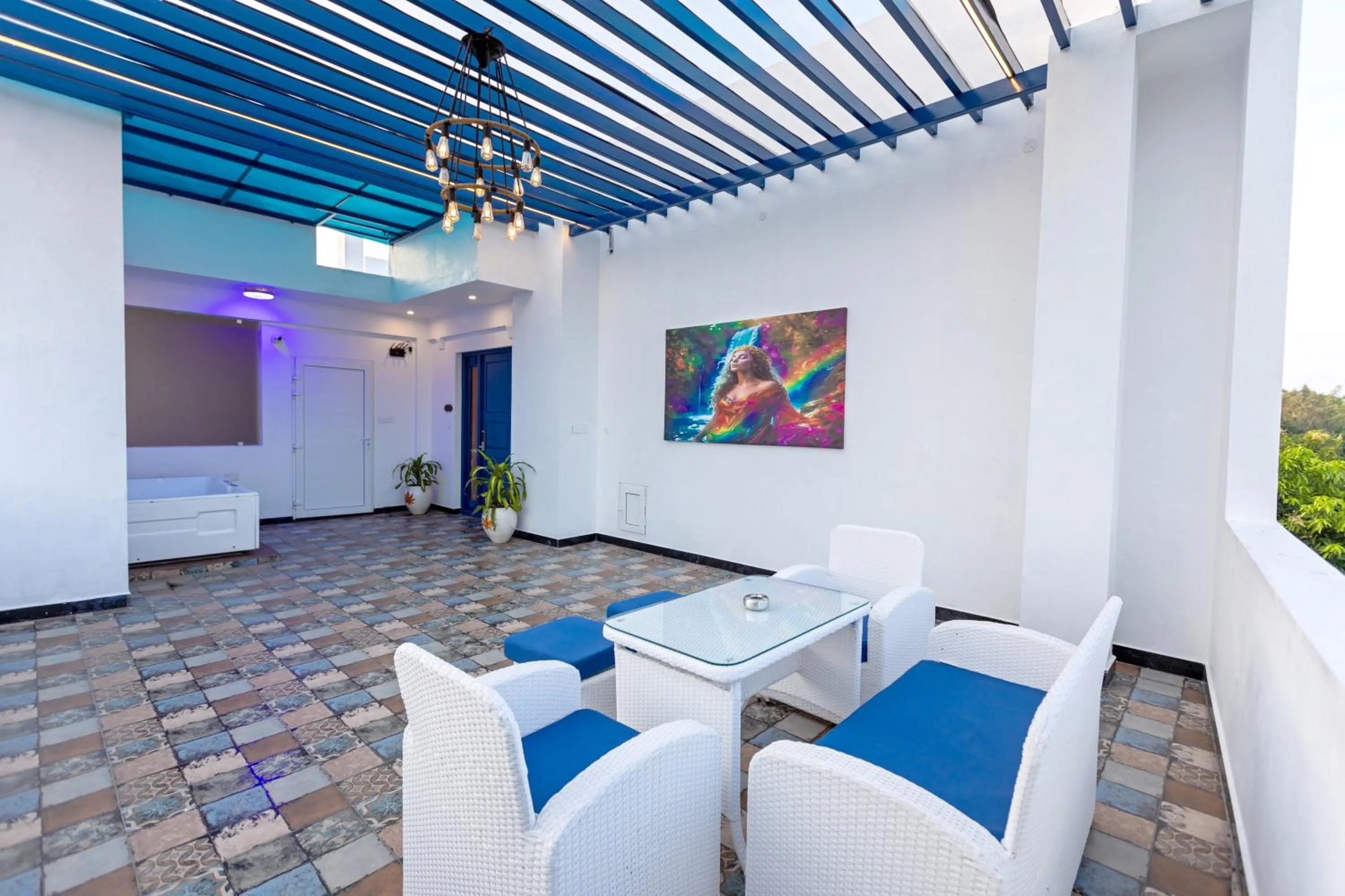 Seating area in T Resort with Swimming Pool