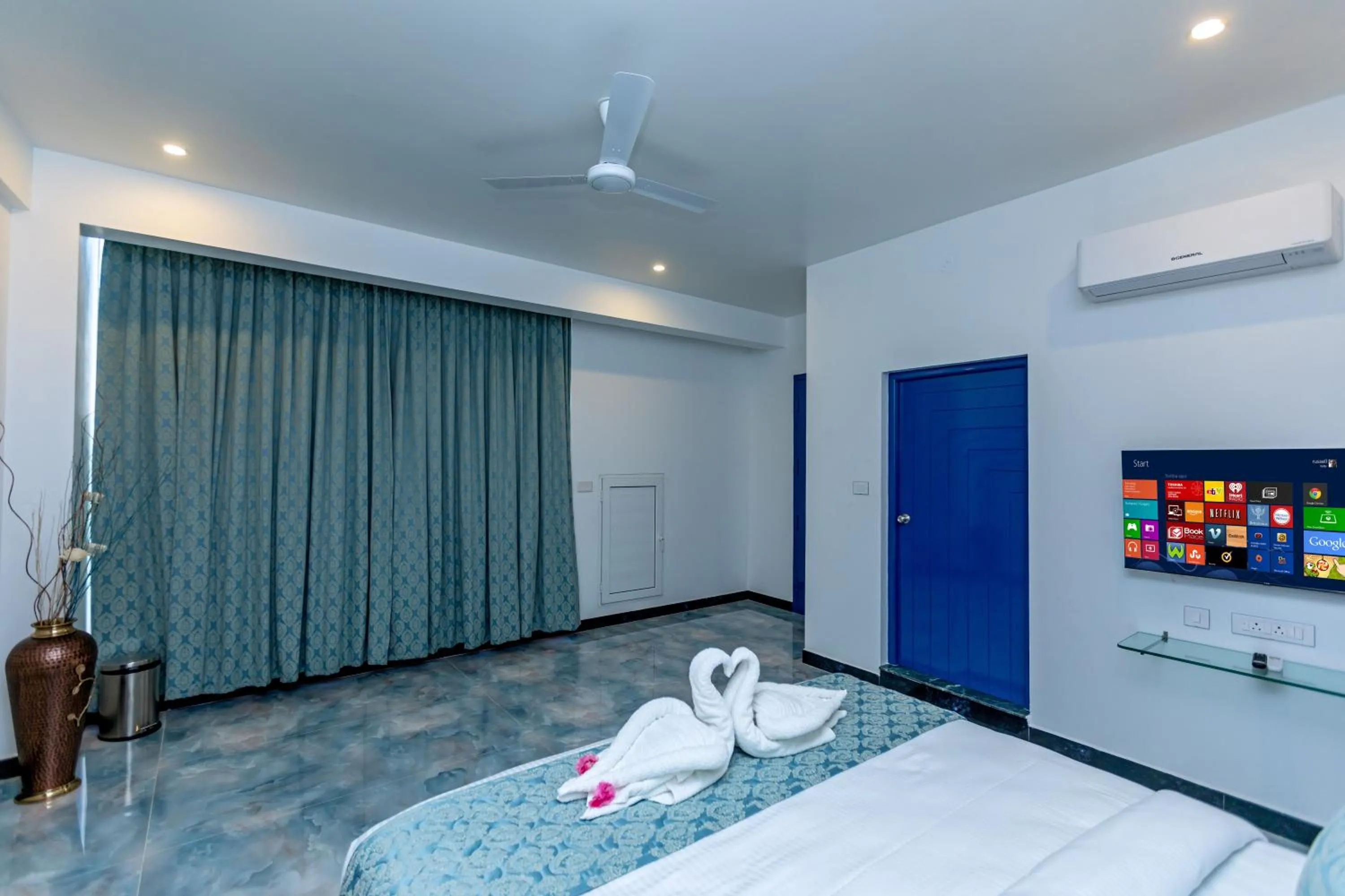 air conditioner, Bed in T Resort with Swimming Pool