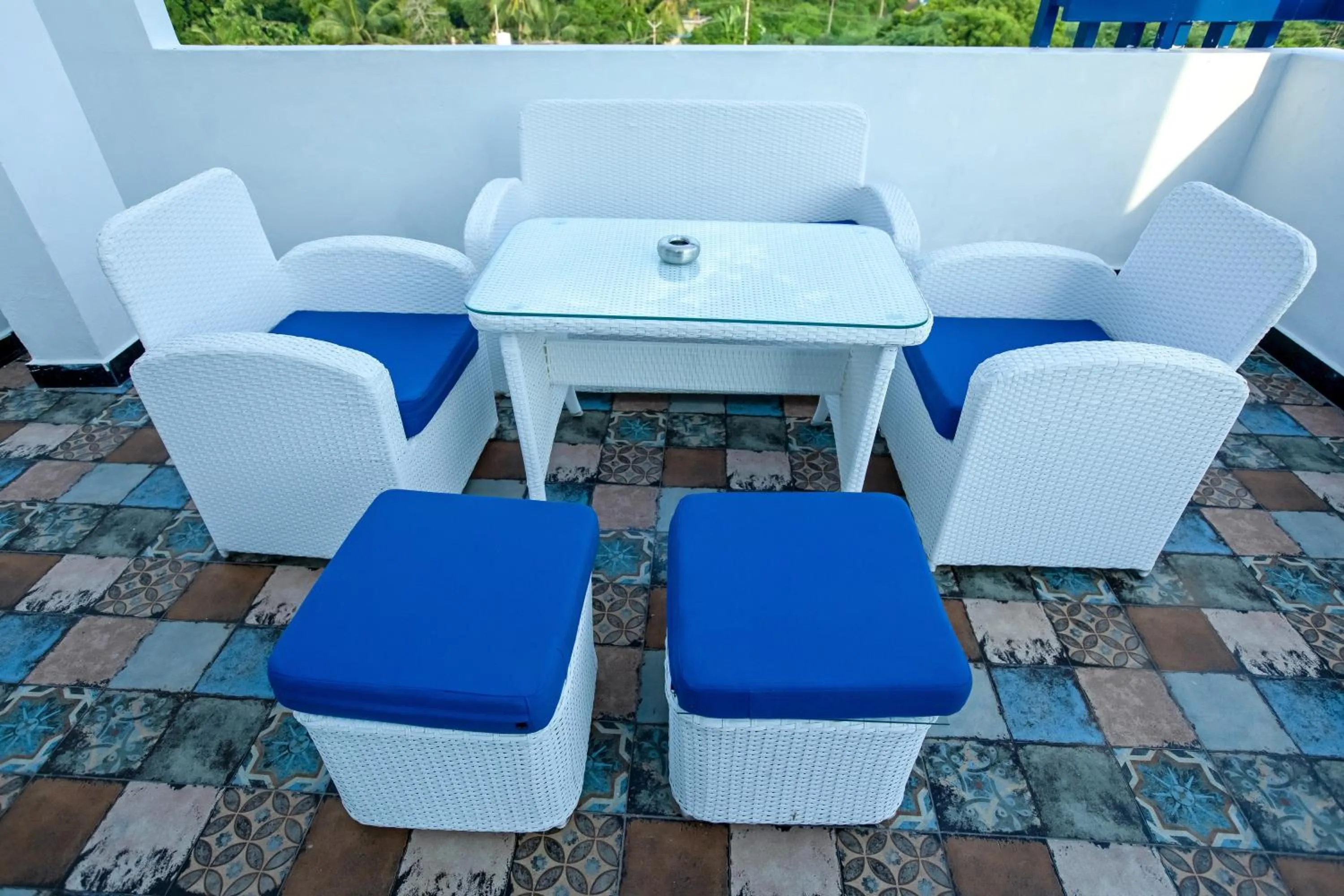 Seating area in T Resort with Swimming Pool